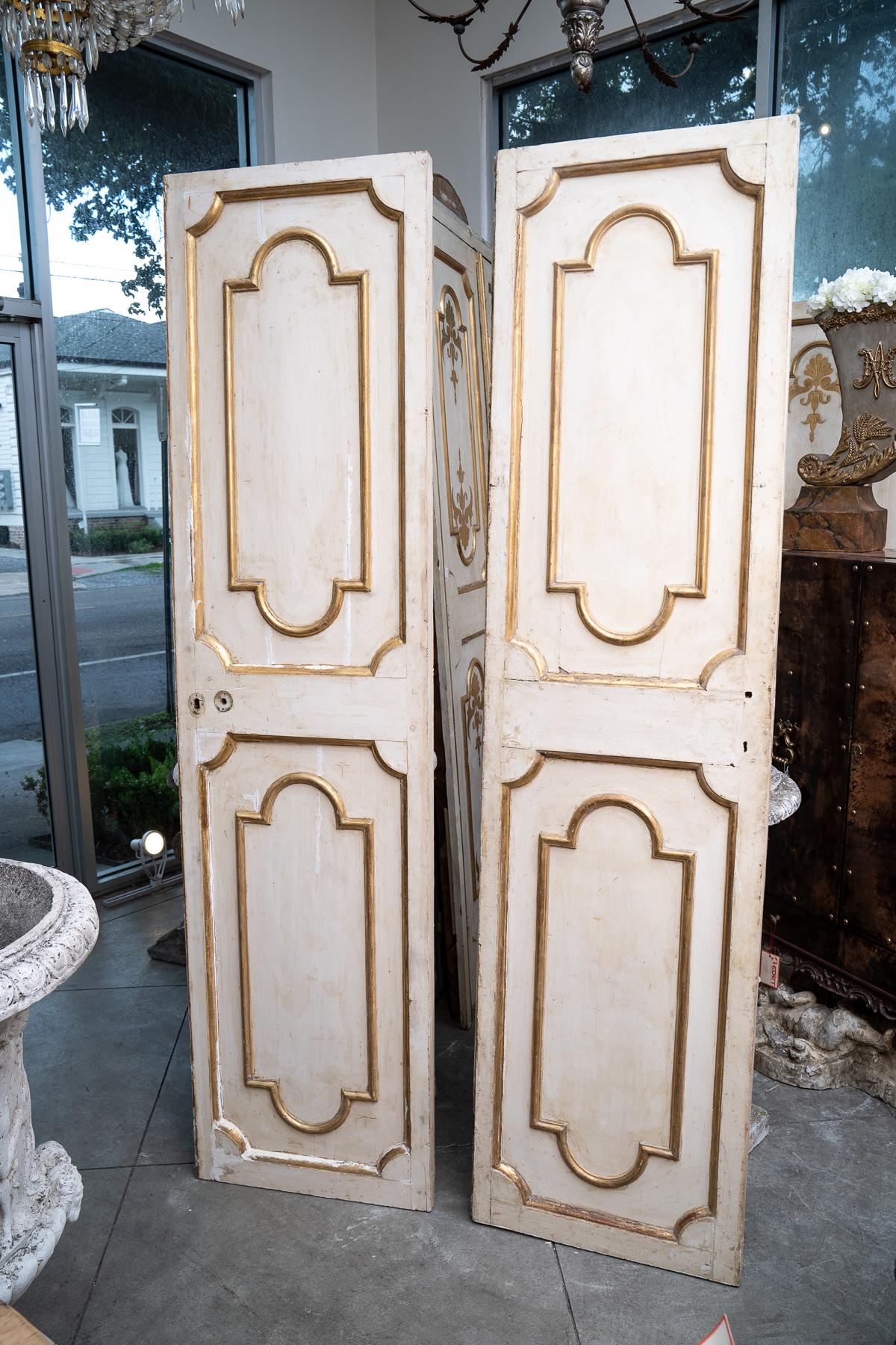 3 sets of 19th century Italian gilded and painted interior doors-some with original hardware.