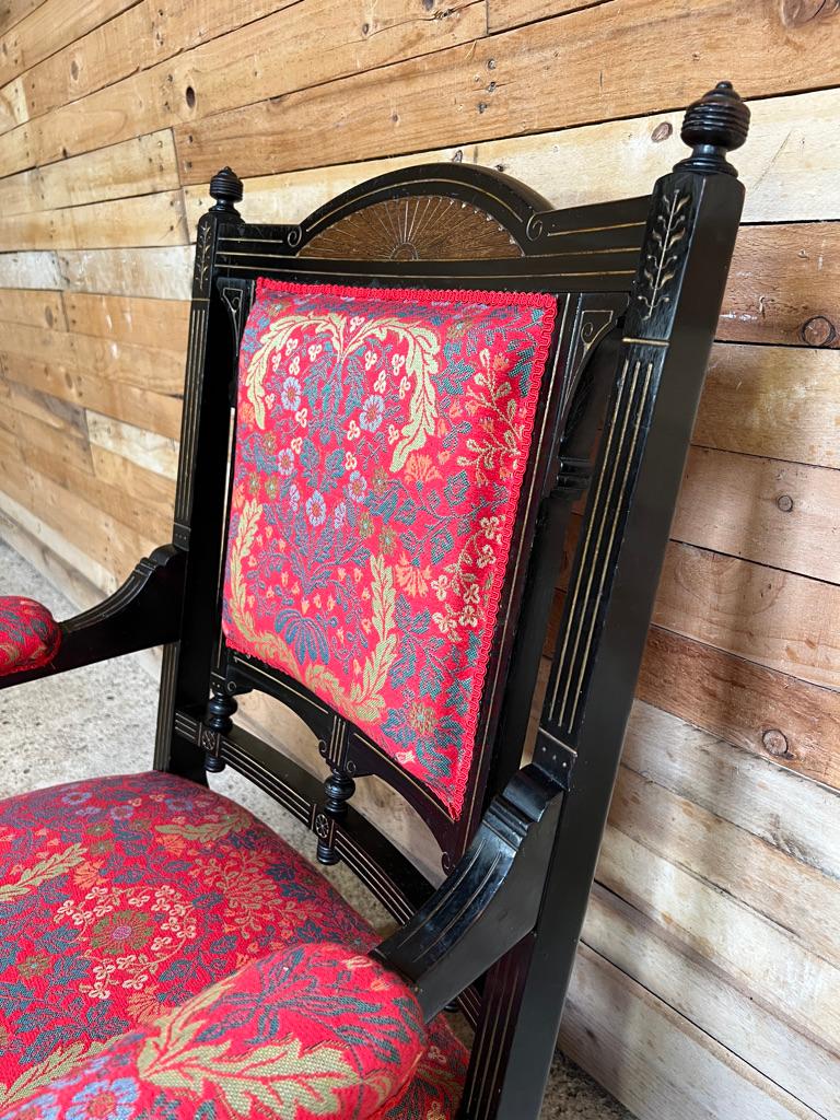 Außergewöhnlicher englischer viktorianischer Sessel in Form eines Armlehns, ebonisiert mit goldener Farbe im Angebot 1