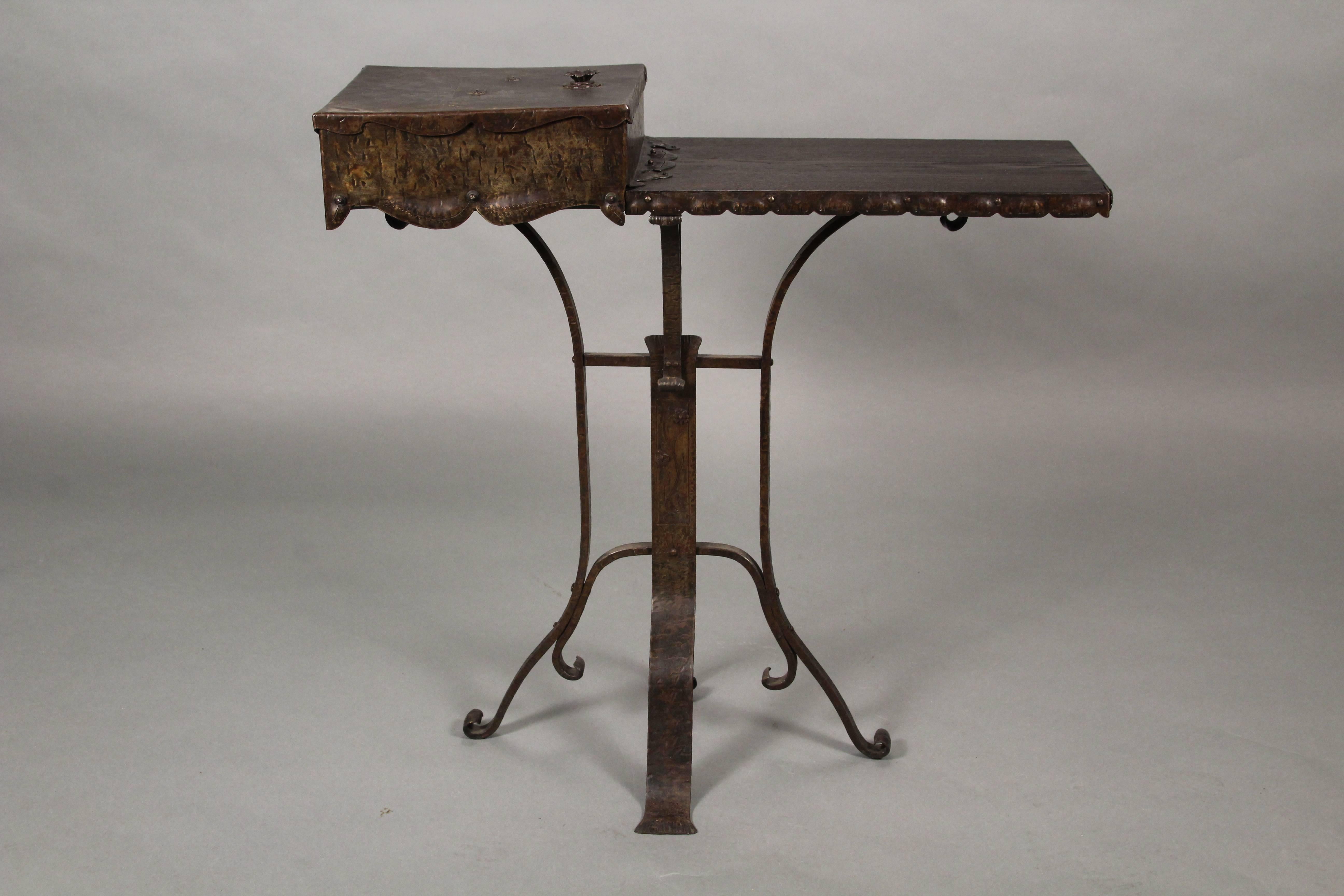 Side table and iron chair, circa 1920s. The iron work is incredibly well executed.
Measures: 32