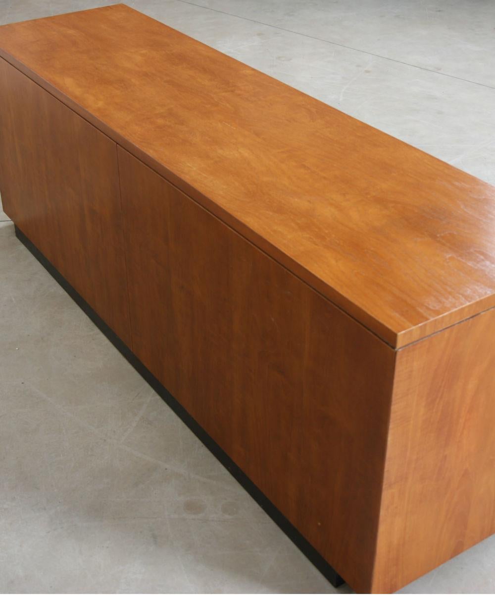 Teak and teak veneer desk credenza, designed by Gordon Bunschaft and made by De Coene for Lambert Bank, circa 1960. The credenza has 4 drawers on the left side and a double changing cupboard on the left side. A single side lock locks all the piece.
