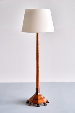 Exceptional Swedish Grace Floor Lamp in Birch with Carved Paw Feet, 1920s