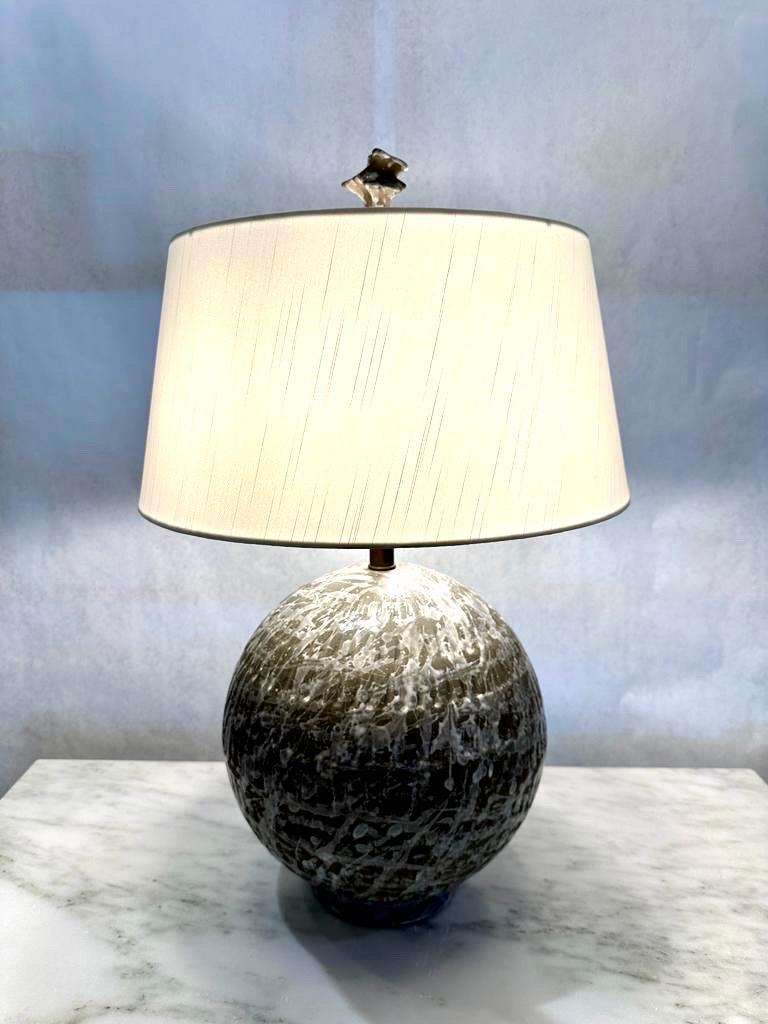 Beautiful California Pottery globe lamp with unique finial in natural tones and textured finish.