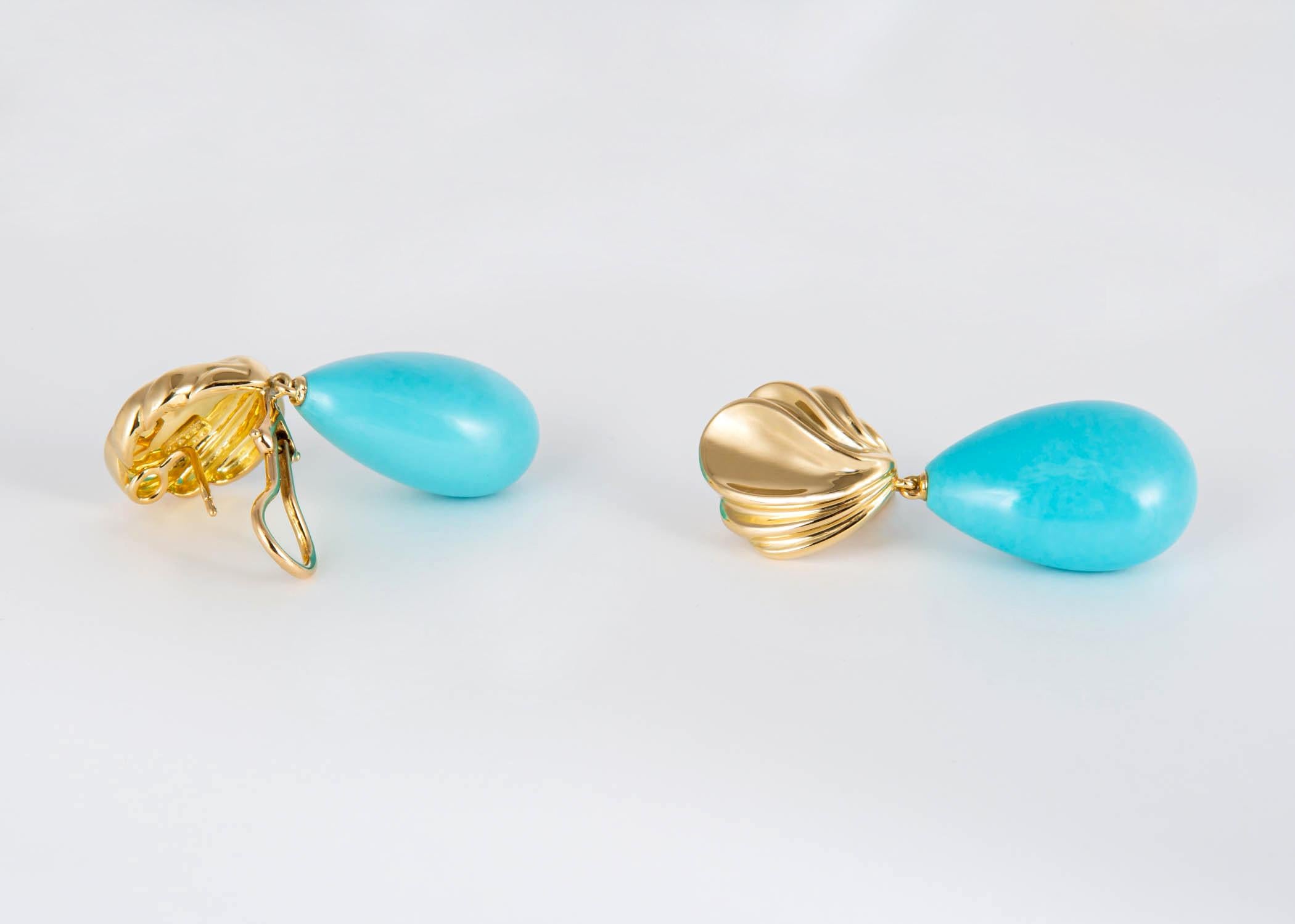 A matched pair of drop shaped natural turquoise absolutely vivid in color. Tiffany design and quality all the way. Exceptional. 1 5/8's inches in length.