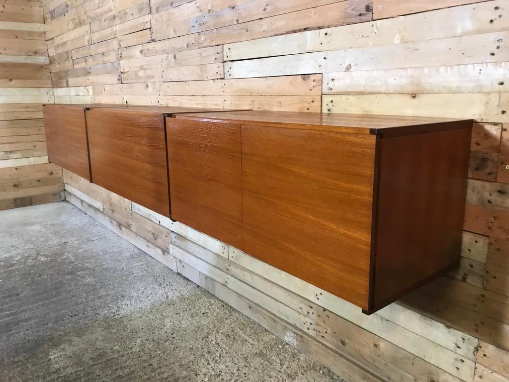 Sought after totally free-hanging extra large sideboard, super minimalistic. Height can be adjusted as required, it is very easy to fix to the wall (with metal or wooden wall brackets which are all included!). This set comes in three parts, each