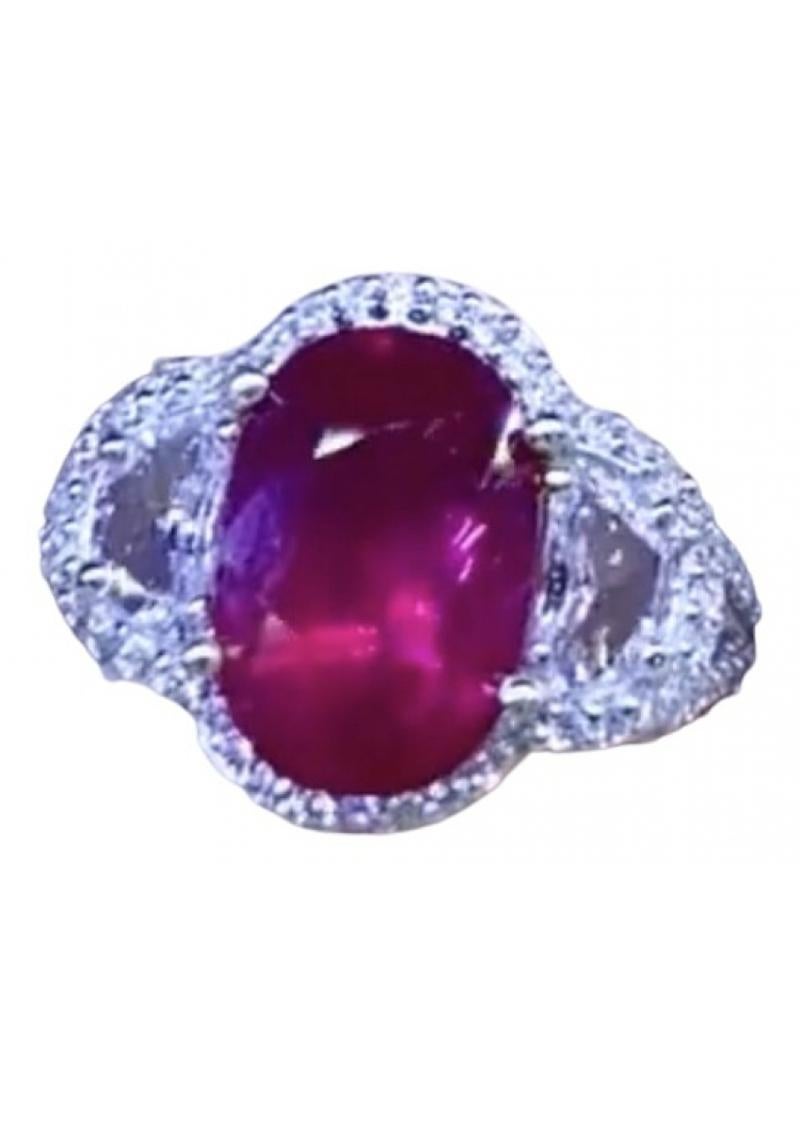 Magnificent color untreated of ruby ct 2,97 on ring in 18k gold excellent for color and clarity quality , with two natural diamonds ct 0,80 top quality and around diamonds brilliant cut ct 0,60 F/VS.
Handmade Italy jewelry by artisan. 
