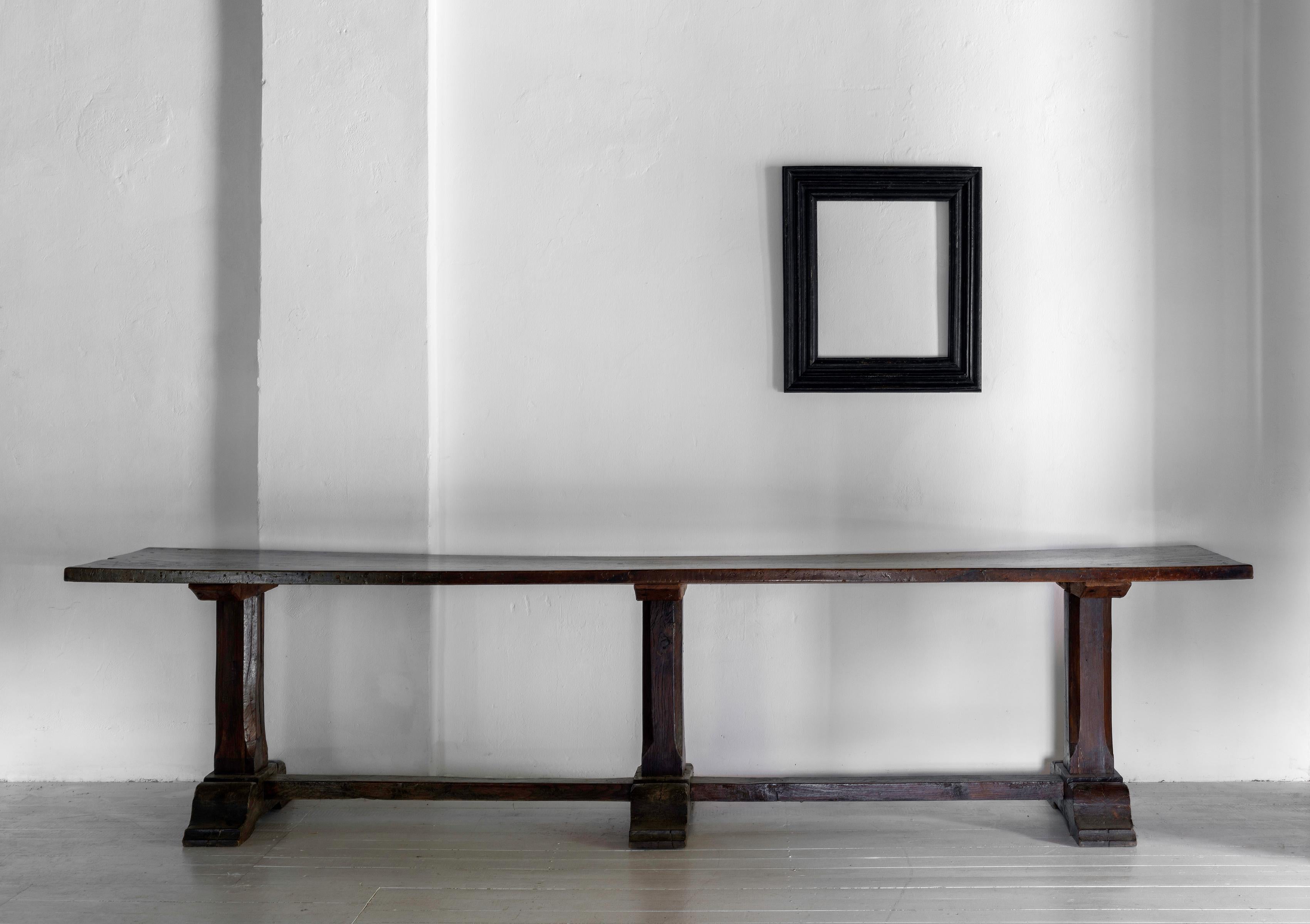 An exceptional 17th century Italian convent table. The top is a single chunky plank of Walnut with perfect patina.
A heavy, beautifully patinated table with great visual impact. Timeless and works in almost any setting.




