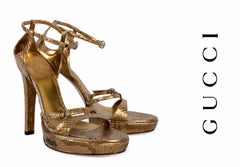 Exceptional vintage Gucci metallic gold python platform sandals 8.5