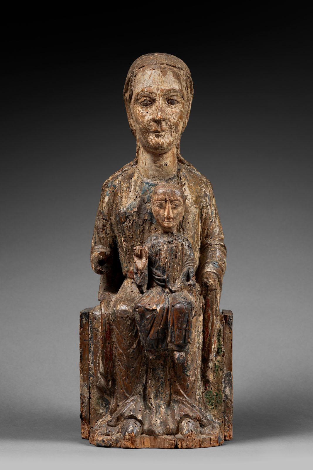 Exceptional virgin and child in majesty
or “Sedes Sapientiae”, throne of wisdom


Origin: southwestern France.
Period: late 12th - early 13th century.

Height: 46cm
Length: 18cm
Depth: 14.5cm 


Walnut wood
Good traces of