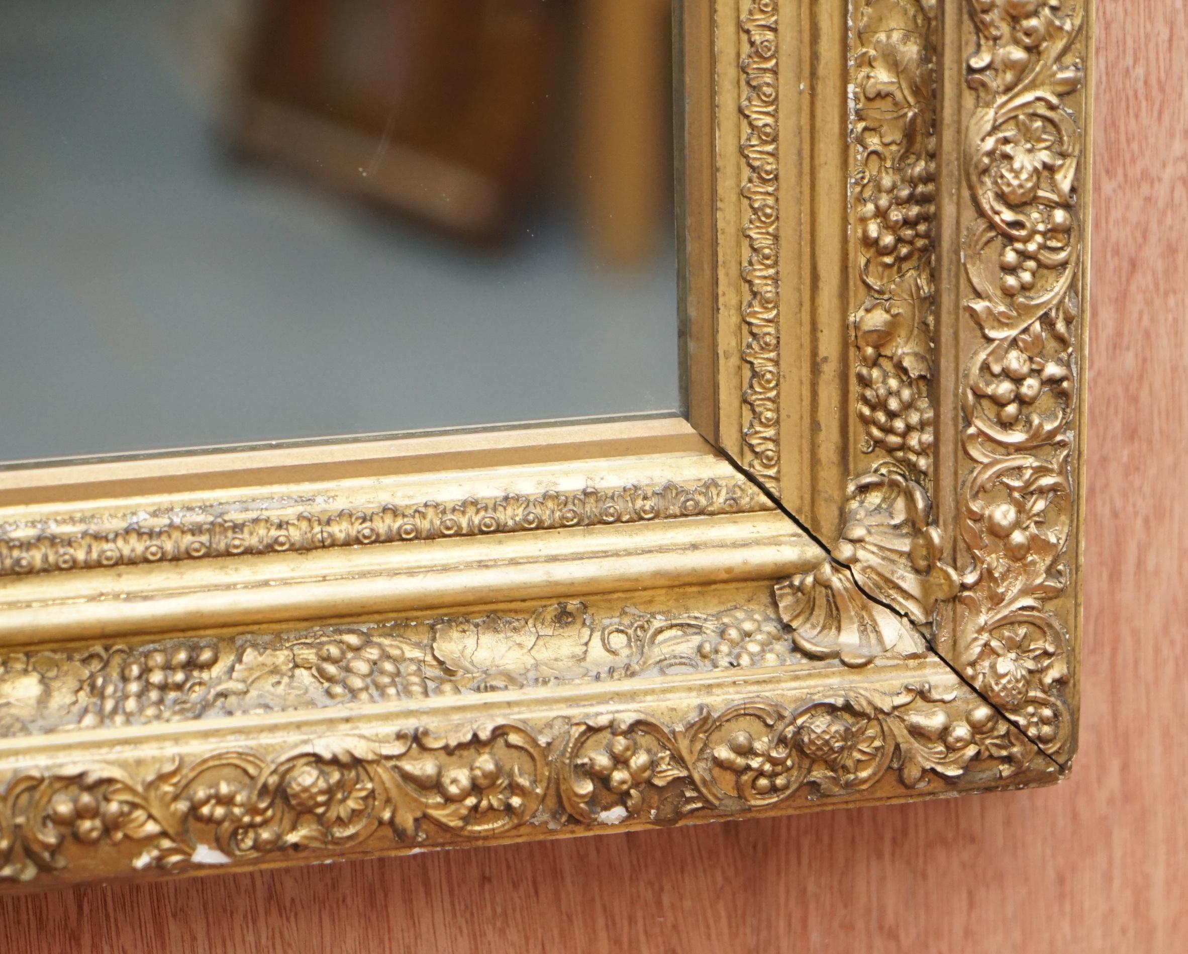 English Exceptionally Carved and Heavily Detailed Period Victorian Wall Giltwood Mirror For Sale