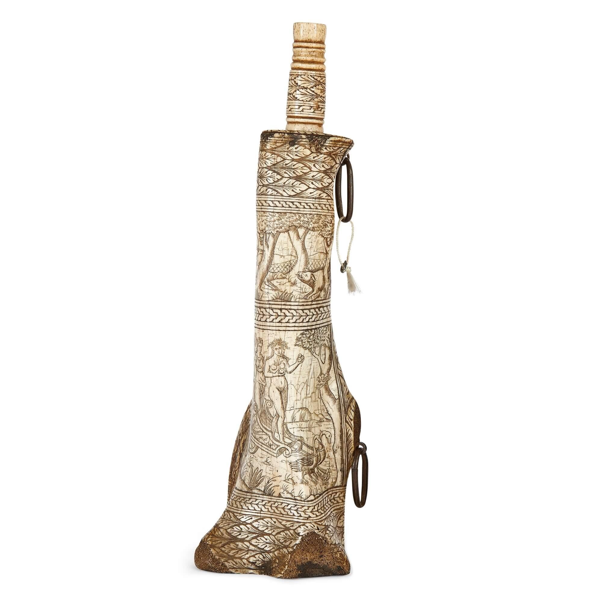 Exceptionally detailed 19th century carved bone gunpowder flask
Italian, 19th Century
Height 36cm, diameter 11cm

This unconventional gunpowder flask, created in Italy in the 19th century, has been meticulously sculpted from a single mammalian femur