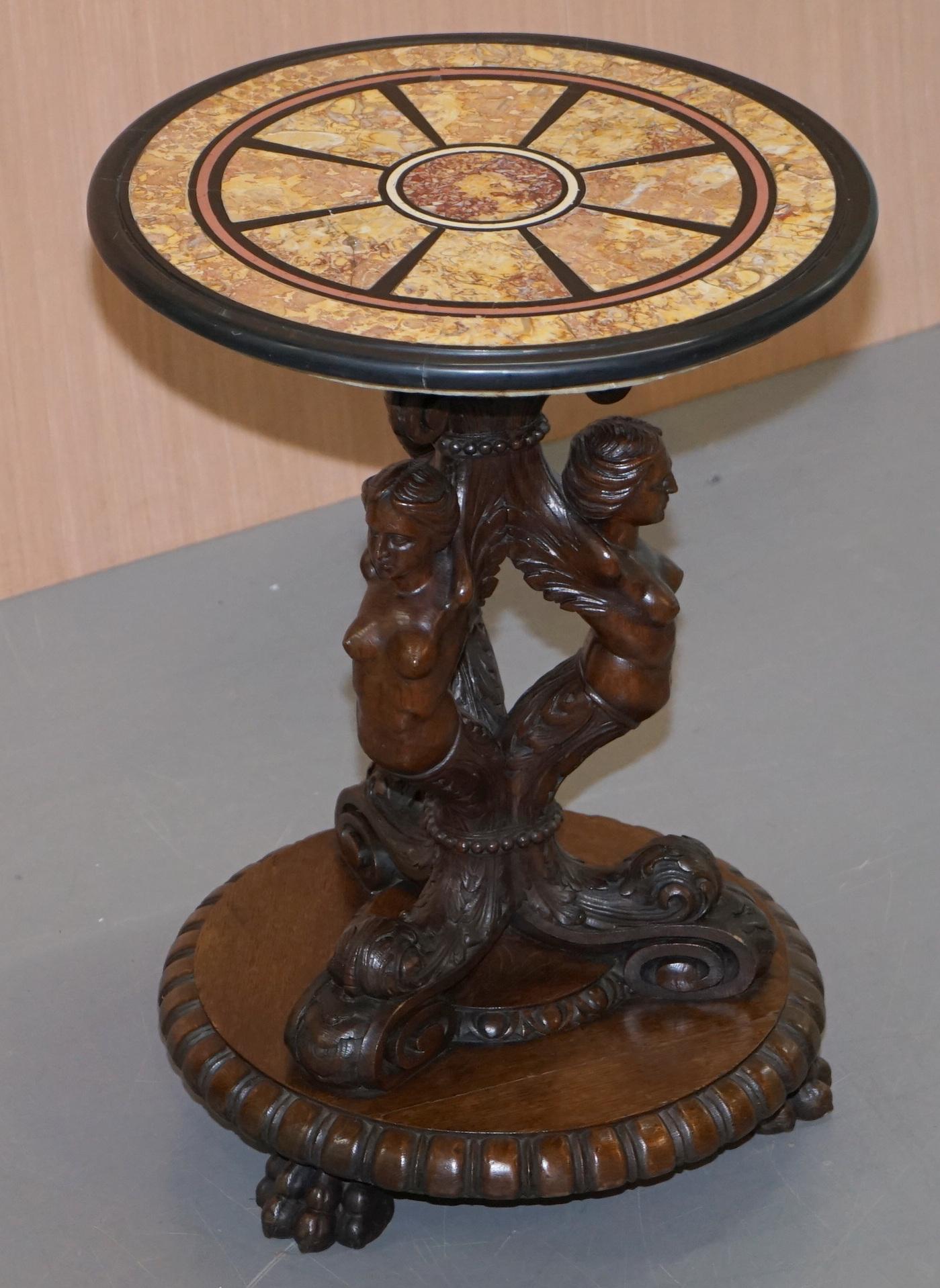 We are delighted to offer for sale this exceptionally fine circa 1800 hand carved English Oak side table with three maidens busts and a later circa 1840 Grand tour marble top

This table is an absolute tour de force is style design and