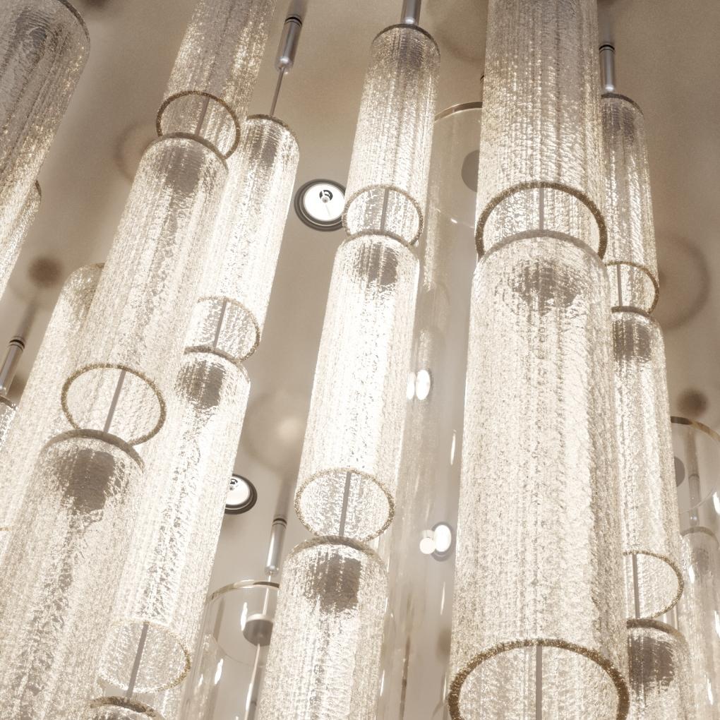 Modular construction made of cylindrical cullet elements. The set includes different sizes, which can be connected with a strong, load-bearing steel cable through the centre of the Murano glass cylinders and secured in any modular way and length.