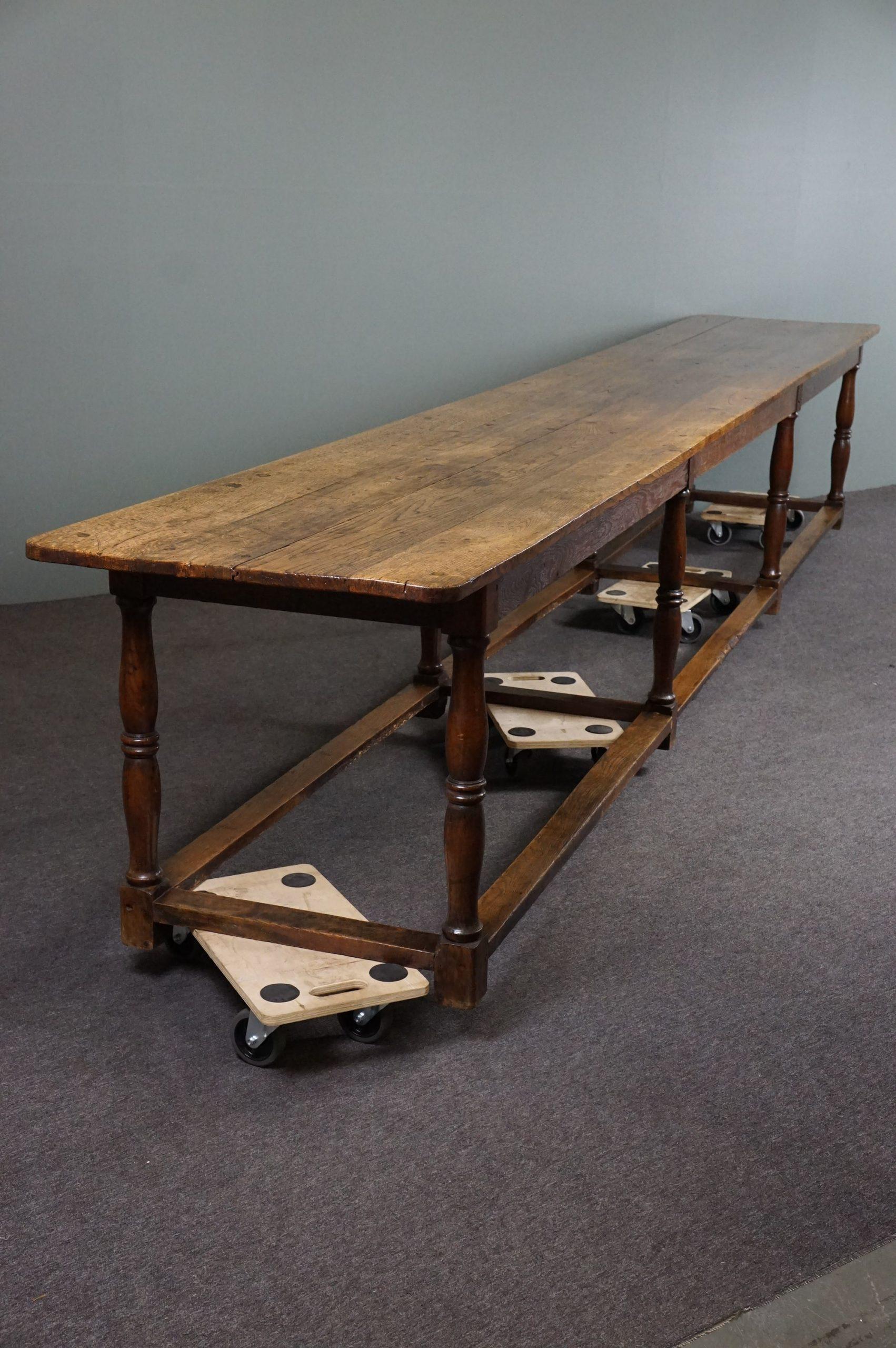 Offered this very spacious antique English oak dining table, 
full with details and therefore an asset for the true enthusiast!

This very large English antique dining table of no less than 5 meters long, full of allure, dates from around 1840/1850