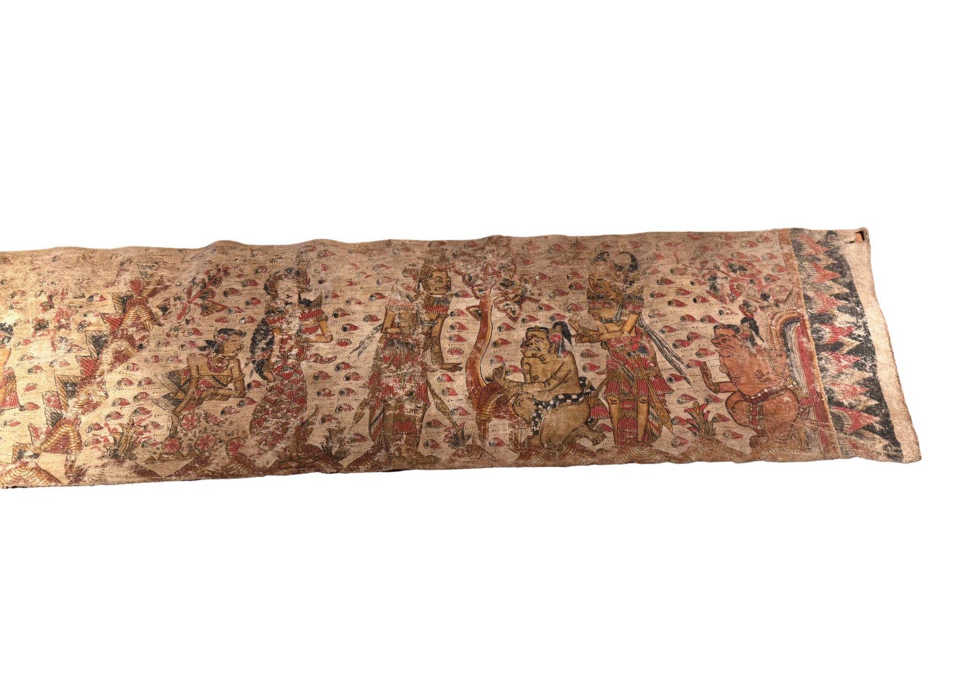This striking vintage Balinese Kamasan painting, rendered on handwoven cotton, beautifully captures the timeless elegance of classical Wayang-style storytelling. Featuring intricate scenes from Hindu epics and Javanese folklore, the artwork is