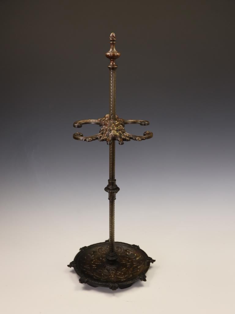 An Exceptionally Ornate 19th-Century Bronze Fireside Stick Stand with Classical Lion Masques
France, circa 1880
A truly fine and richly cast late 19th-century bronze stick stand, distinguished by its profusion of exquisite detail and commanding