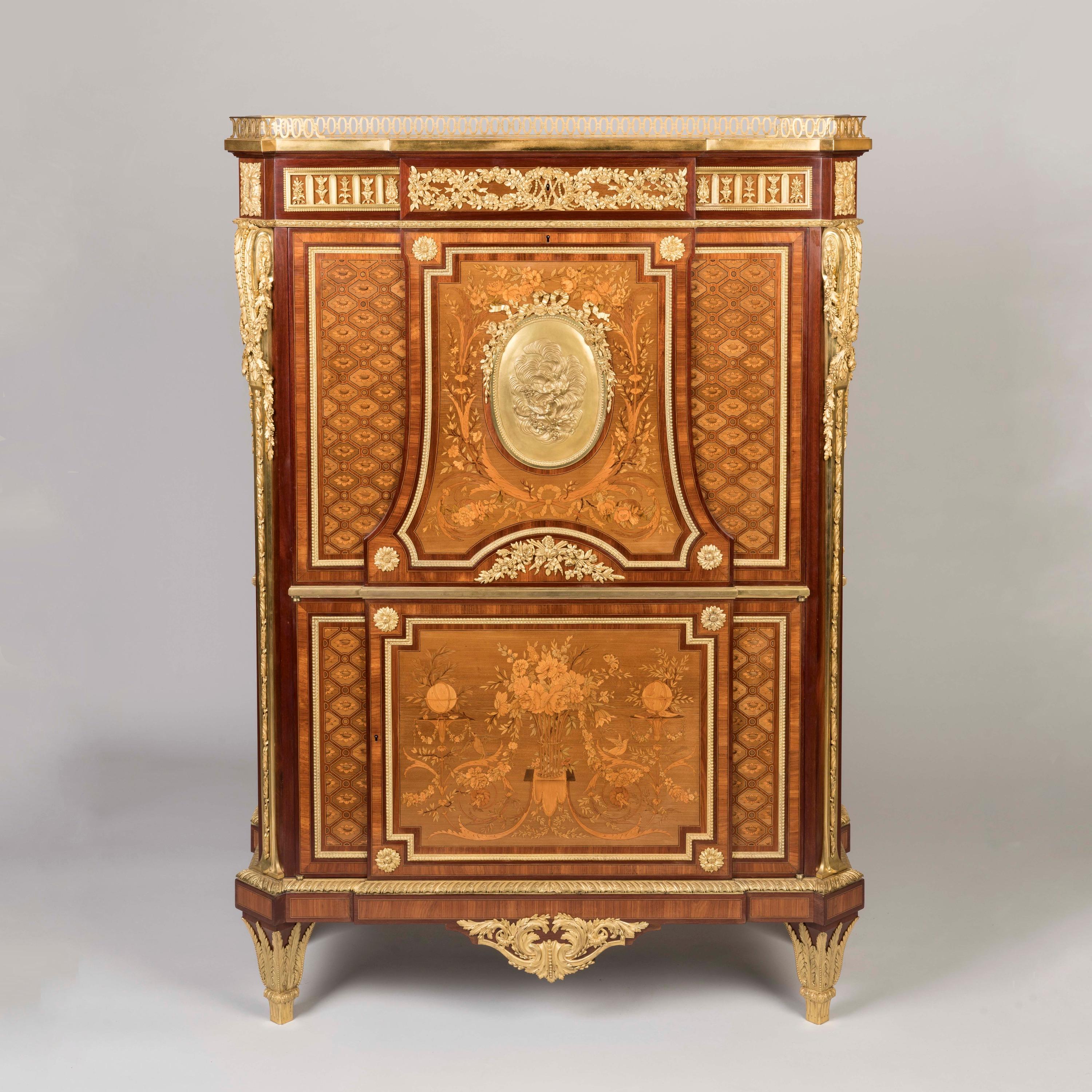 An Exceptionally Rare Secrétaire à Abattant
After the designs of Jean-Henri Riesener for Marie Antoinette

By Paul Sormani of Paris

Of upright rectangular form with canted corners and slight breakfront profile, veneered with panels of marquetry