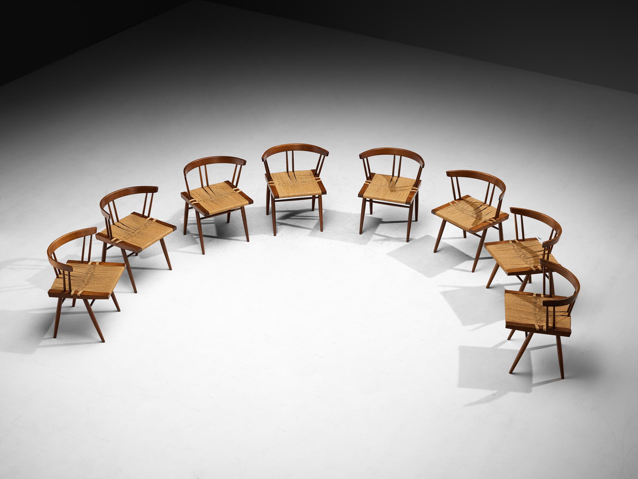 George Nakashima, set of eight 'Grass-seated Chairs', American black walnut, sea grass cord, United States, early 1960s

Through its pure form, thoughtful use of materials, and exquisite woodwork, this exceptionally large set of grass-seated dining
