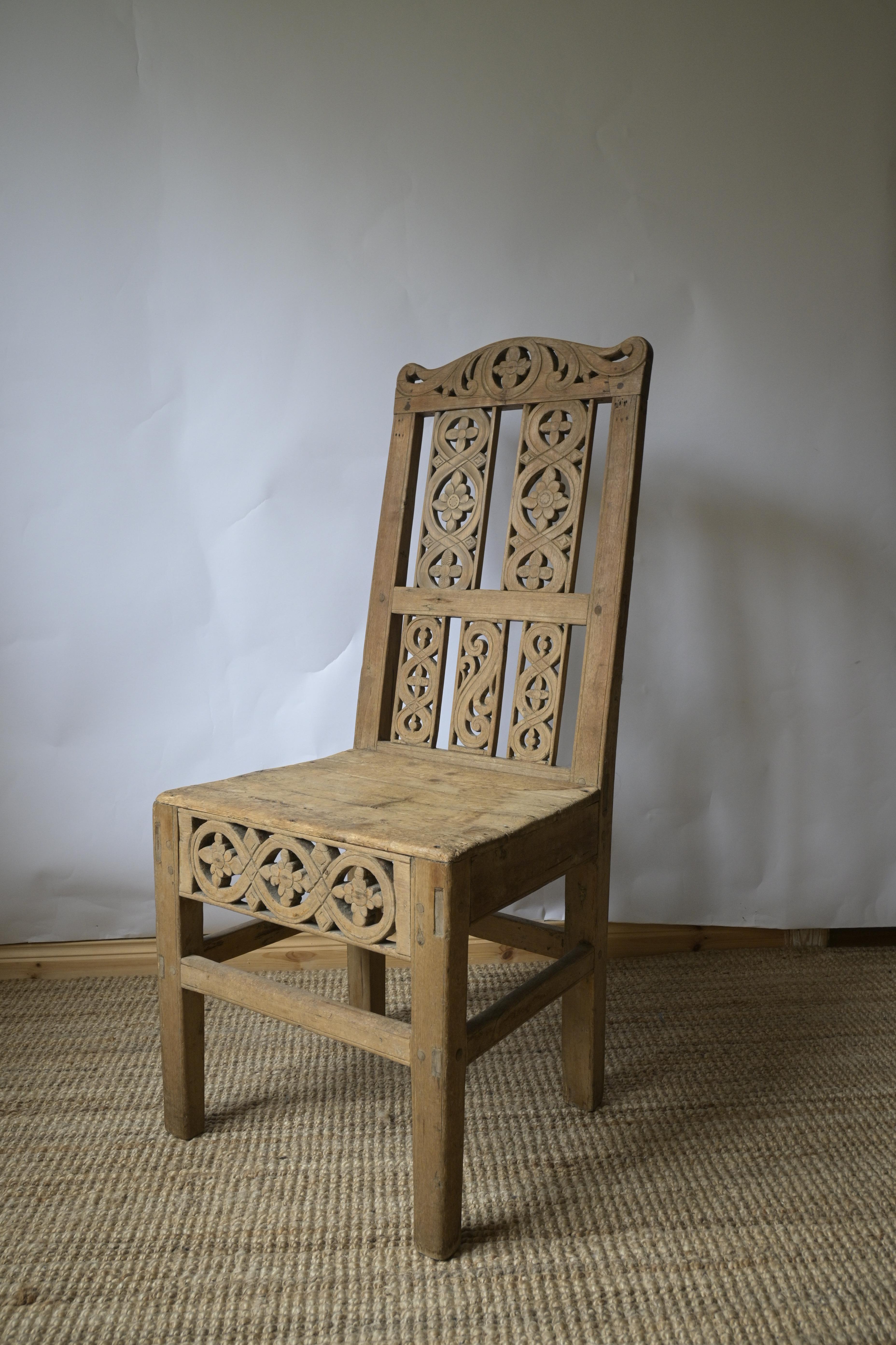 Telemark Chair from Norway second half of the 18th century 

An exceptional example of Norwegian craftsmanship, this Telemark chair dates to the second half of the 1700s and features richly carved decorations that exemplify the region's traditional