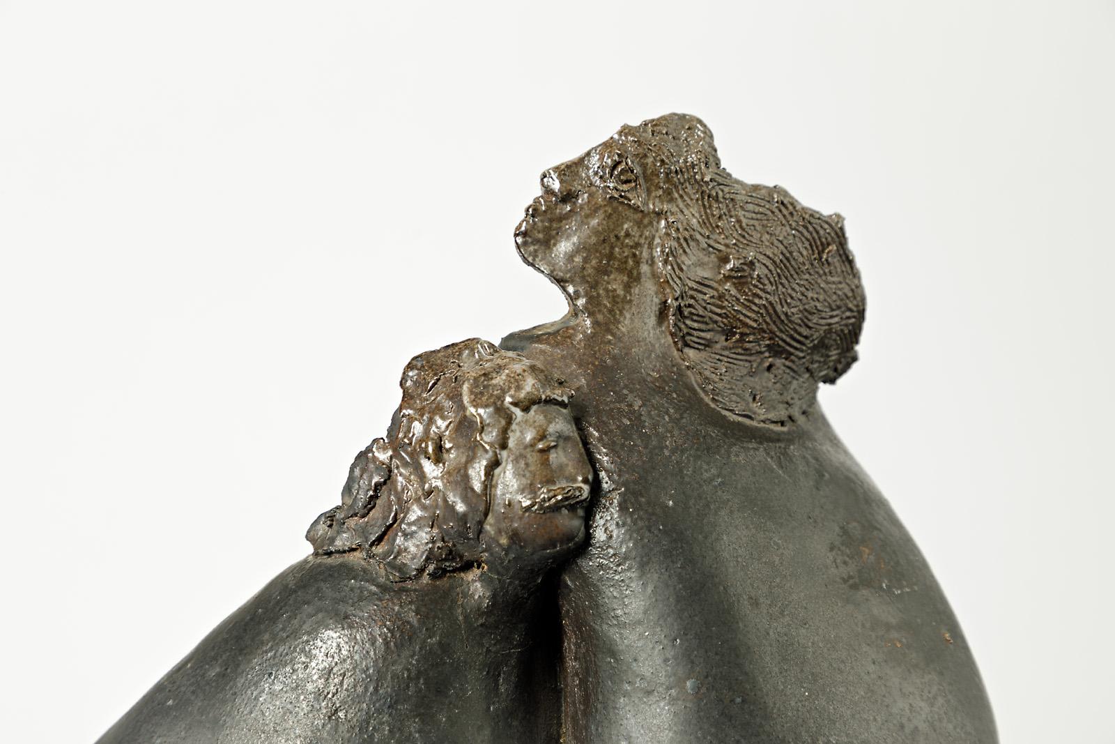 Jeanne Grandpierre (born in 1945)

Exceptionnal stoneware ceramic sculpture representing a couple.

Beautiful black and gold ceramic glaze.

Excellent original condition.

Signed under the base.

Circa 1980.

Dimensions : 40x29x11cm