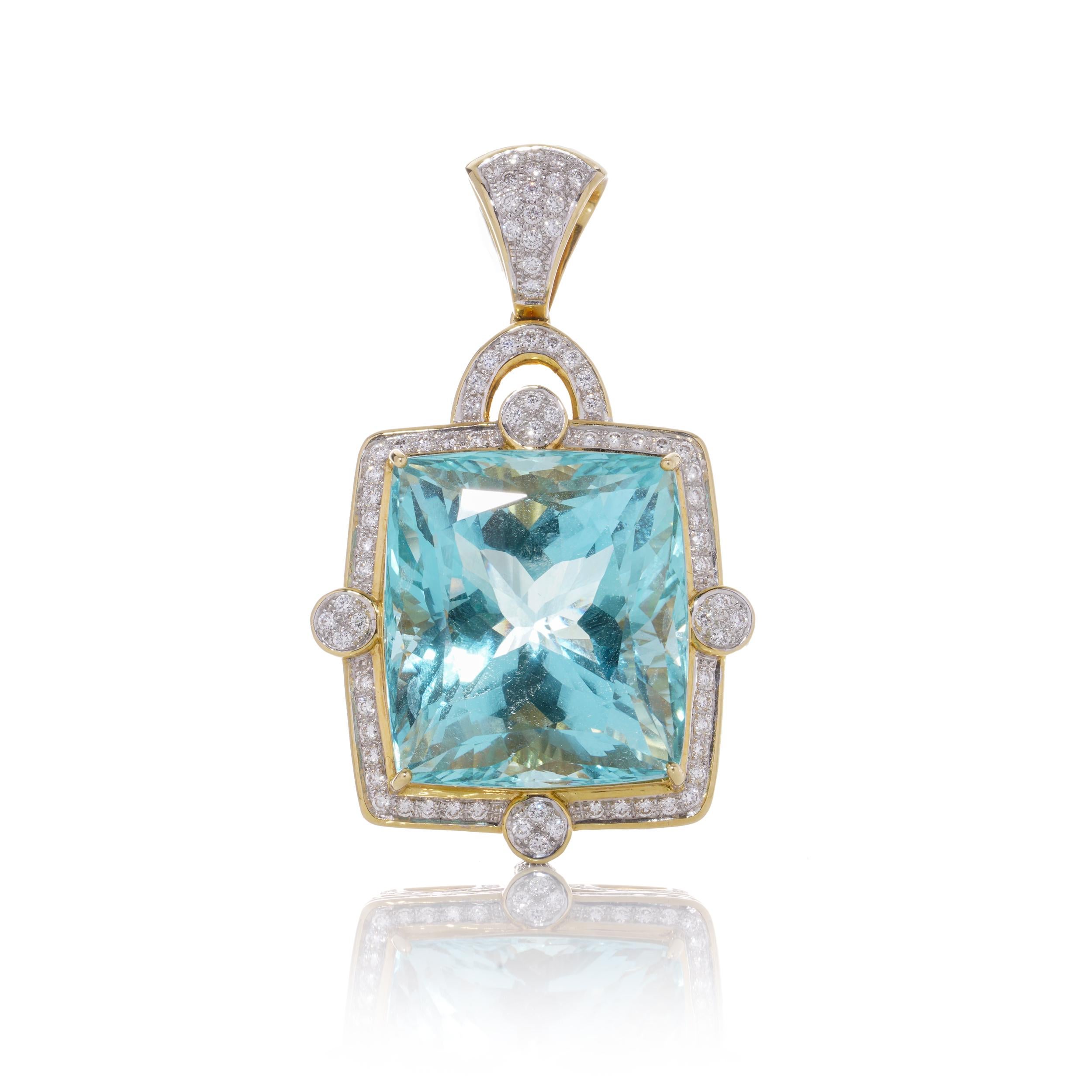 Exclusive 18k. yellow and white gold approx. 120 carats of Aquamarine pendant, surrounded by round brilliant cut diamonds.

Dimensions:
Length: 5.5 cm ( with bail )
Width: 3.3 cm
Depth: 2 cm

Pendant Weight: 39.7 grams

Aquamarine -
Cut: Rectangular