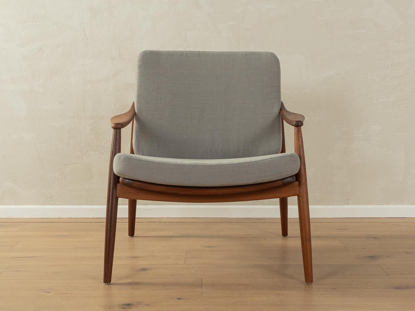 Exclusive armchair, Type 400, from the 1950s by Hartmut Lohmeyer for Wilkhahn. High-quality teak frame with new, contemporary wicker work. The armchair has been reupholstered and covered with a high-quality grey upholstery fabric.

Quality