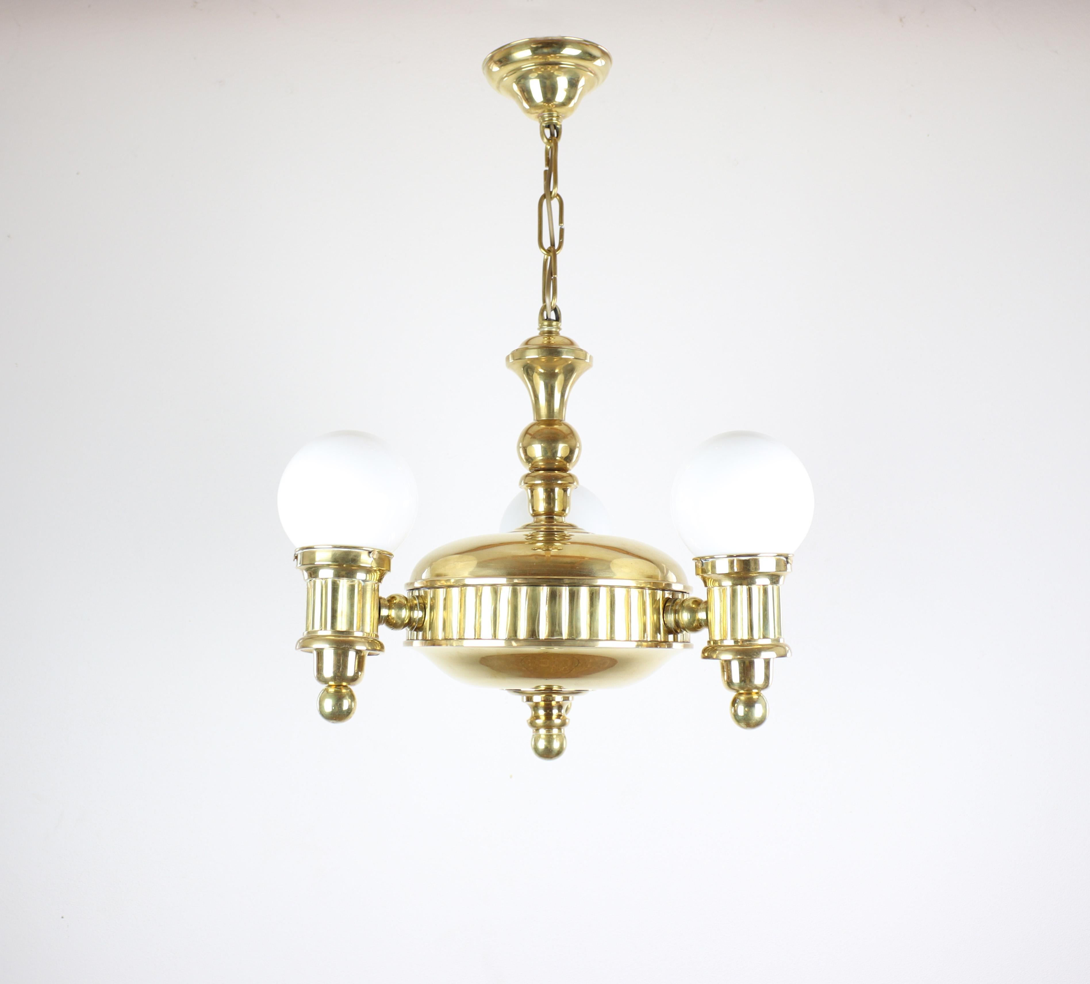 Create the perfect home atmosphere with this exclusive antique luminaire. Art deco hanging chandelier, which has a mechanism that allows the horizontal rotation of the arms by 180 degrees, which allows you to create exactly the lighting conditions