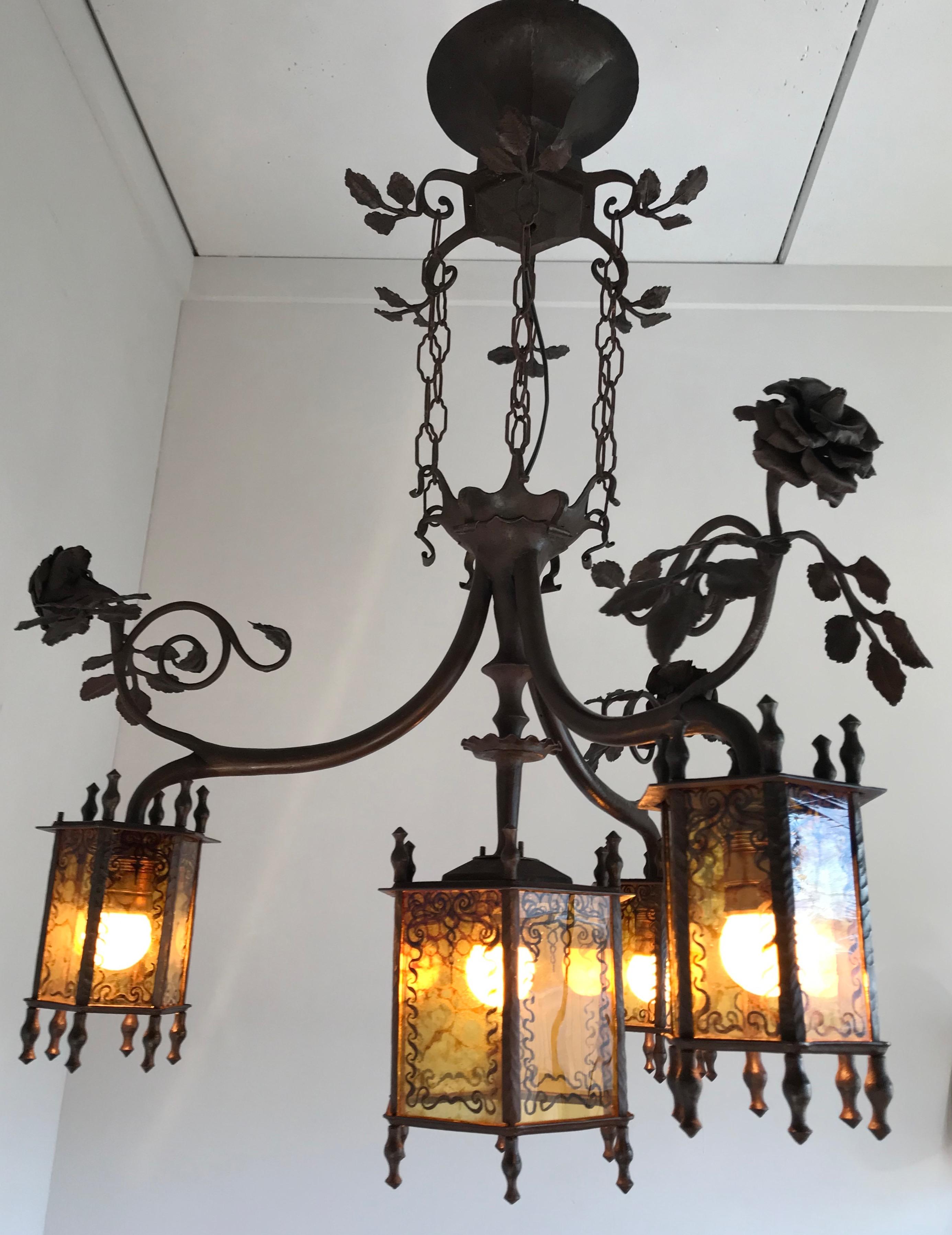 Amazing and all handcrafted Arts & Crafts chandelier.

This early 20th century work of lighting art is the only one of its kind and it is in very good condition. If you are a collector of top-quality, early 1900s workmanship then this forged in fire