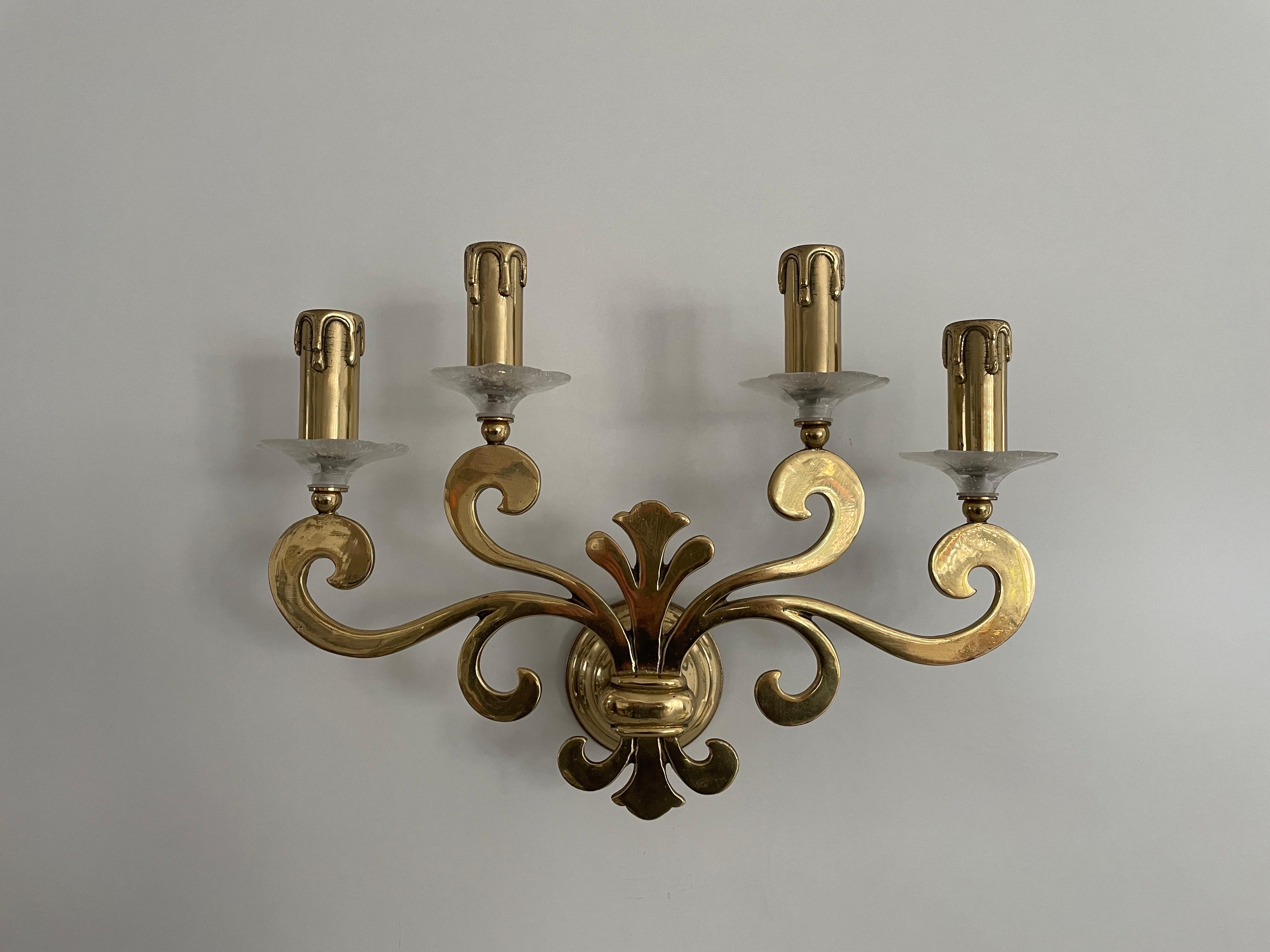 Exclusive Brass 4-armed Single Sconce by Hans Möller, 1960s, Germany

Sculptural very elegant rare heavy wall lamp.

It is very ideal and suitable for all living areas.

Lamp is in good condition. No damage, no crack.
Wear consistent with age and