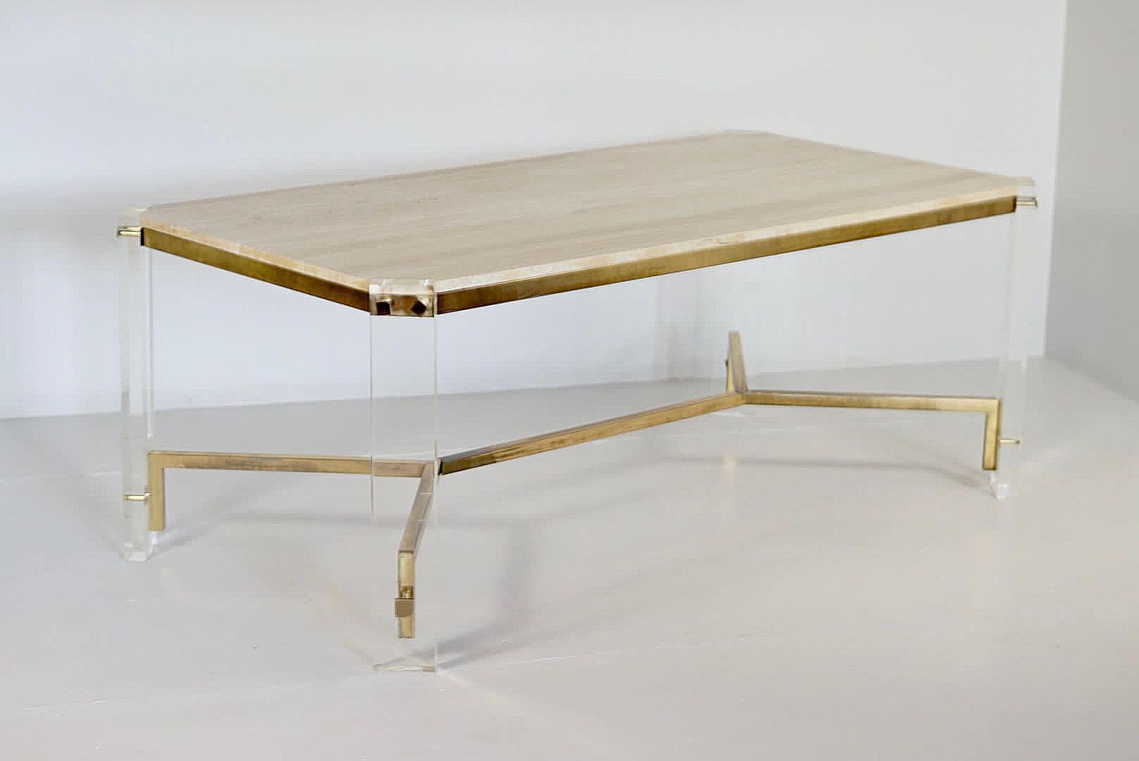 Exclusive dining table in brass and travertine with lucite legs.

in absolute perfect condition with little usage marks.

Video on request.

Height 74cm

Depth 100cm

Width 190cm