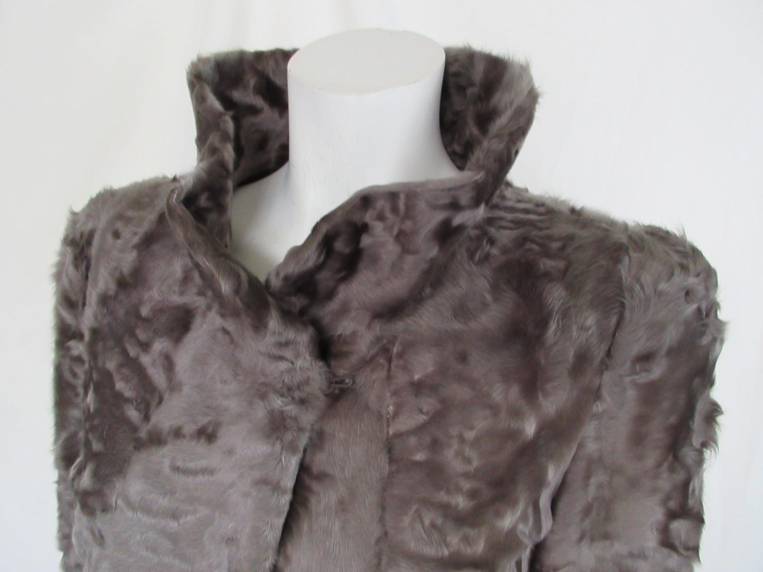 This exclusive model is made of the finest naturel Russian broadtail fur which is rare to find.

We offer more luxury fur items, view our frontstore.

Details:
Color: brown/ taupe
With 2 pockets, 1 closing clip at the collar, 3 closing hooks
Fully