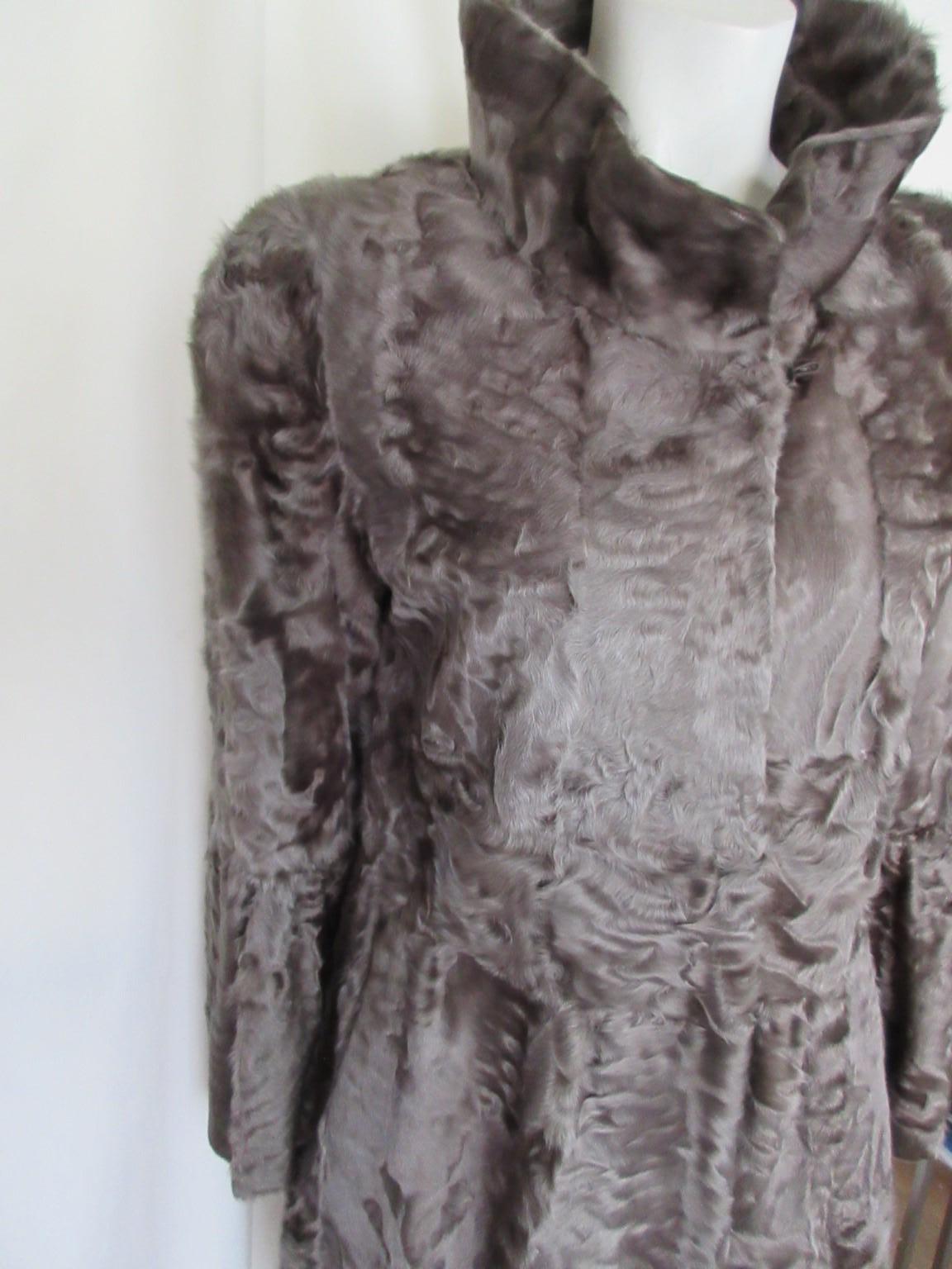 Exclusive Broadtail Fur Coat In Excellent Condition For Sale In Amsterdam, NL