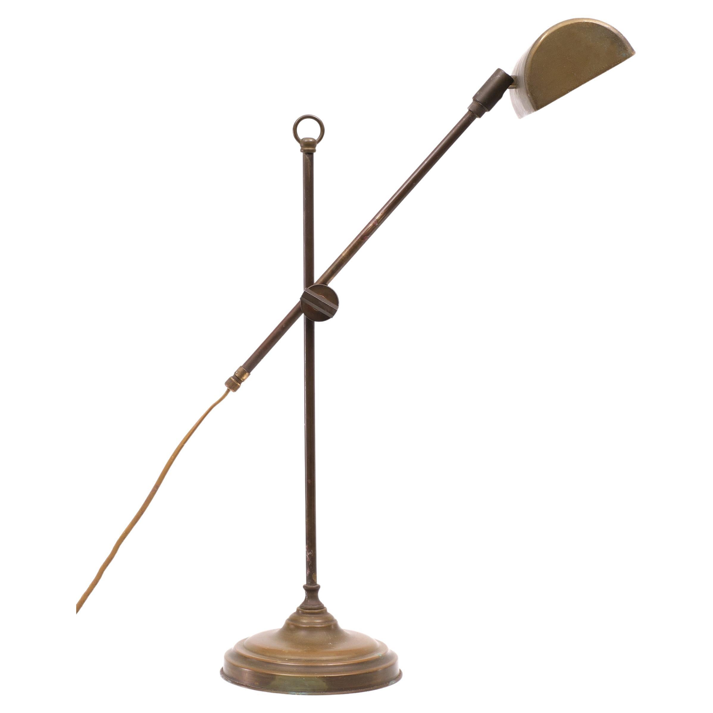 Exclusive bronze desk lamp. Made in Italy manufactured by Framon.
Signed inside the shade. Adjustable in height. Small socket bulb needed.