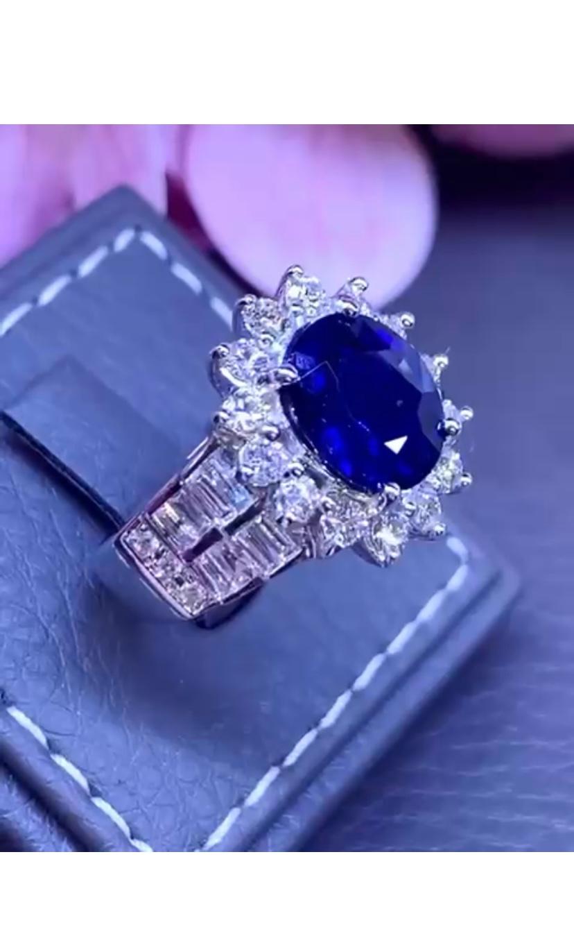 So exquisite flower design in 18k gold with royal blue sapphire ct 3,83, and round brilliant cut and baguettes cut diamonds ct 1,55 F/VS.
Handmade fine Jewels by artisan goldsmith.
Excellent manufacture and quality.
Complete with AIG.

Note: on my