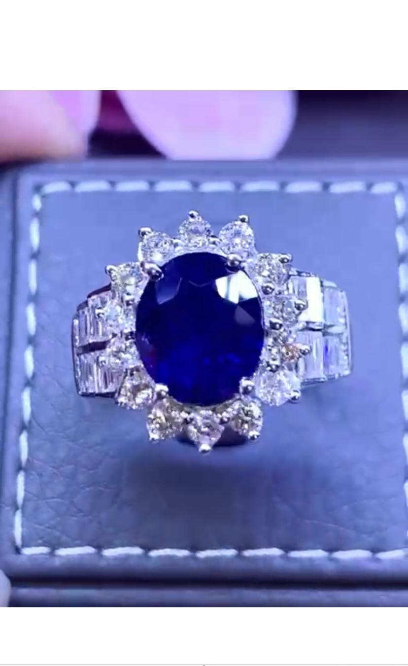 Oval Cut Exclusive Ct 5, 28 of Royal Blue Sapphire and Diamonds on Ring For Sale