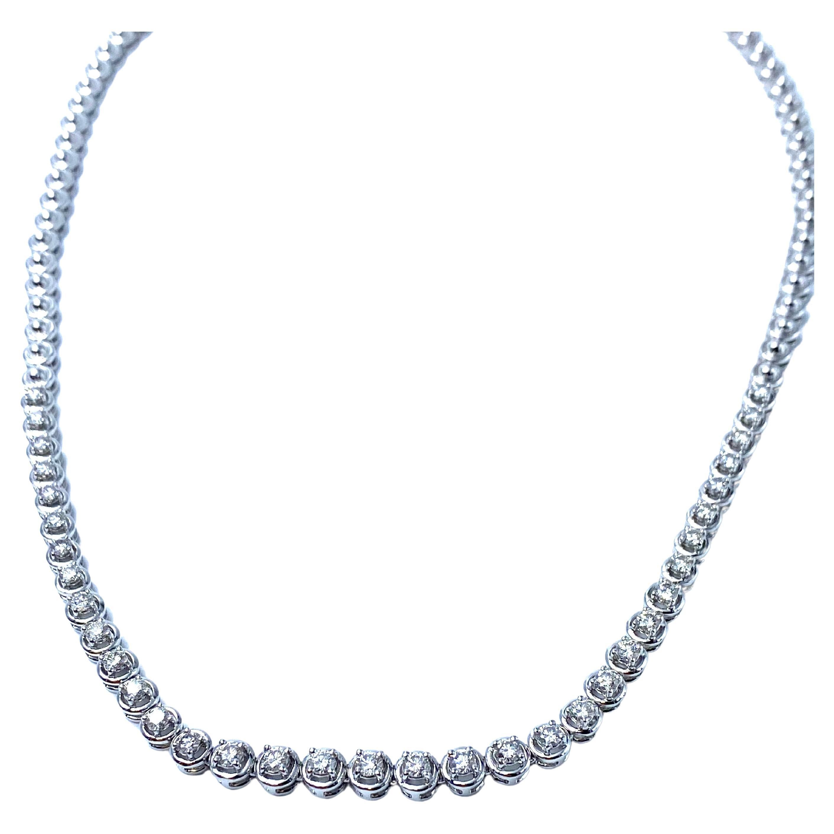 Stunning tennis necklace signed Damiani, Italy.
Crafted in 18K white gold, it mounts 35 brilliant-cut natural diamonds for a total carat weight of over 3.5 ct.
Excellent condition, like new