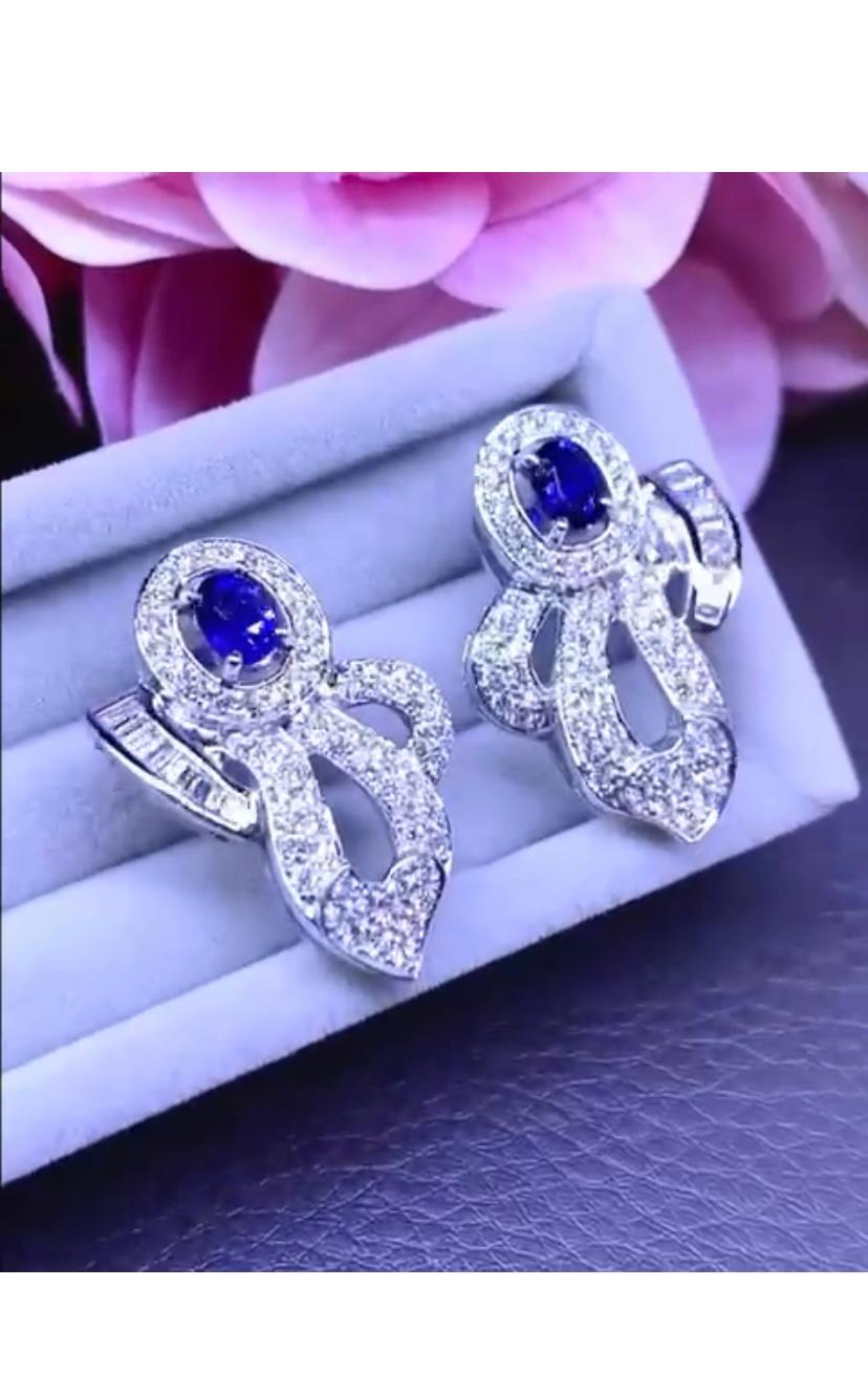  An exquisite contemporary design , so elegant and chic, in 18k gold with 2 pieces of oval cut Ceylon sapphires in royal blue of 1,47 carats and round and baguettes cut diamonds of 1,91 
carats F/VS.
Handcrafted by artisan goldsmith.
Excellent