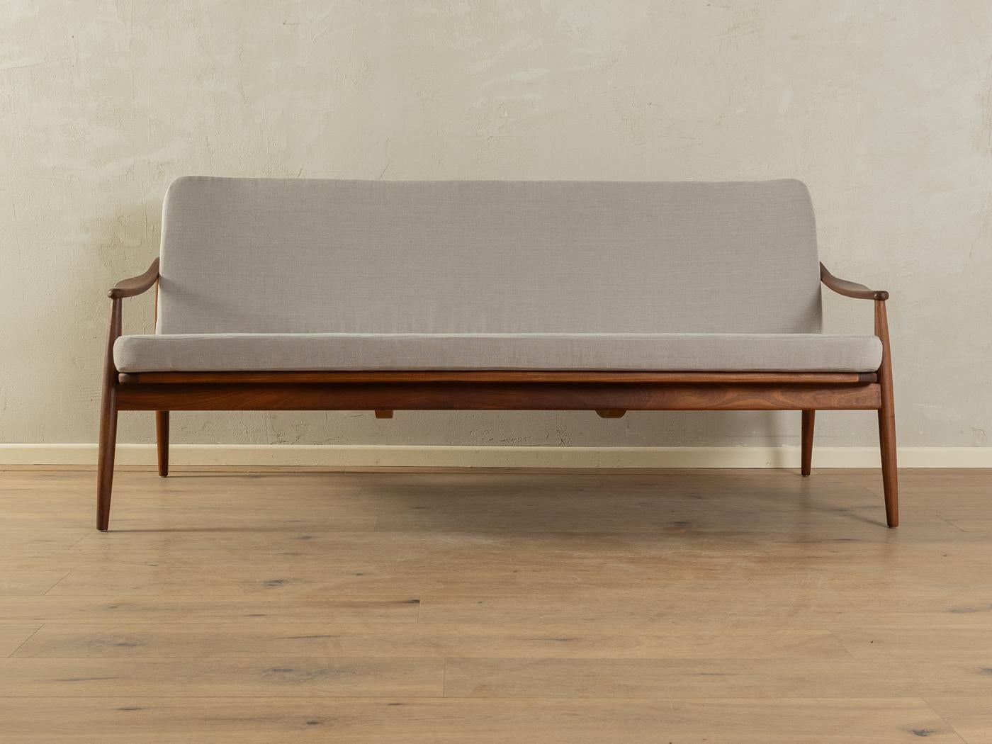 Exclusive furniture suite, with one sofa and two armchairs of Type 400 from the 1950s by Hartmut Lohmeyer for Wilkhahn. High-quality teak frame with new contemporary wicker work. The furniture suite has been reupholstered and covered with a