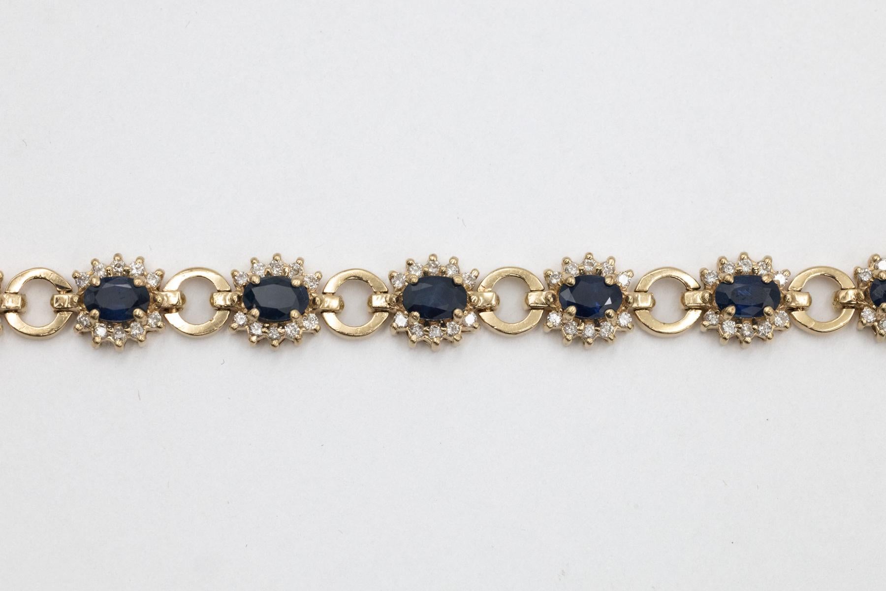 Bracelet exclusif en or avec saphirs et diamants en vente 1
