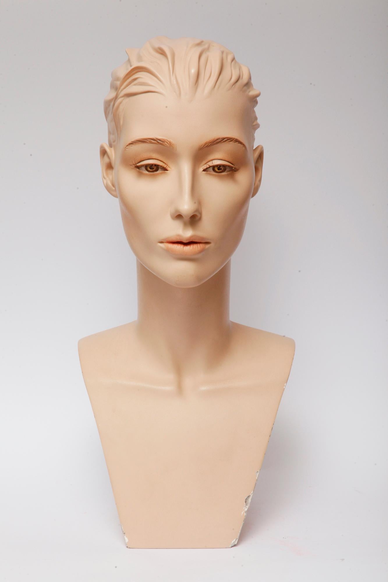 Women's realistic, advertising mannequin, bust used to display necklaces. Extremely realistic, meticulously finished in black ink, with realistic eyes, eyebrows and eyelashes. In excellent condition for its age, with a few minor gypsum defects at