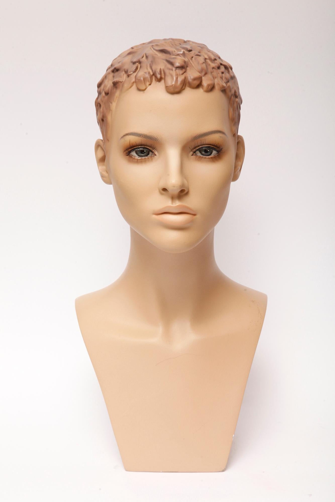 Women's realistic, advertising mannequin, bust used to display necklaces. Extremely realistic, meticulously finished in black ink, with realistic eyes, eyebrows and eyelashes. In excellent condition for its age, with a few minor gypsum defects at
