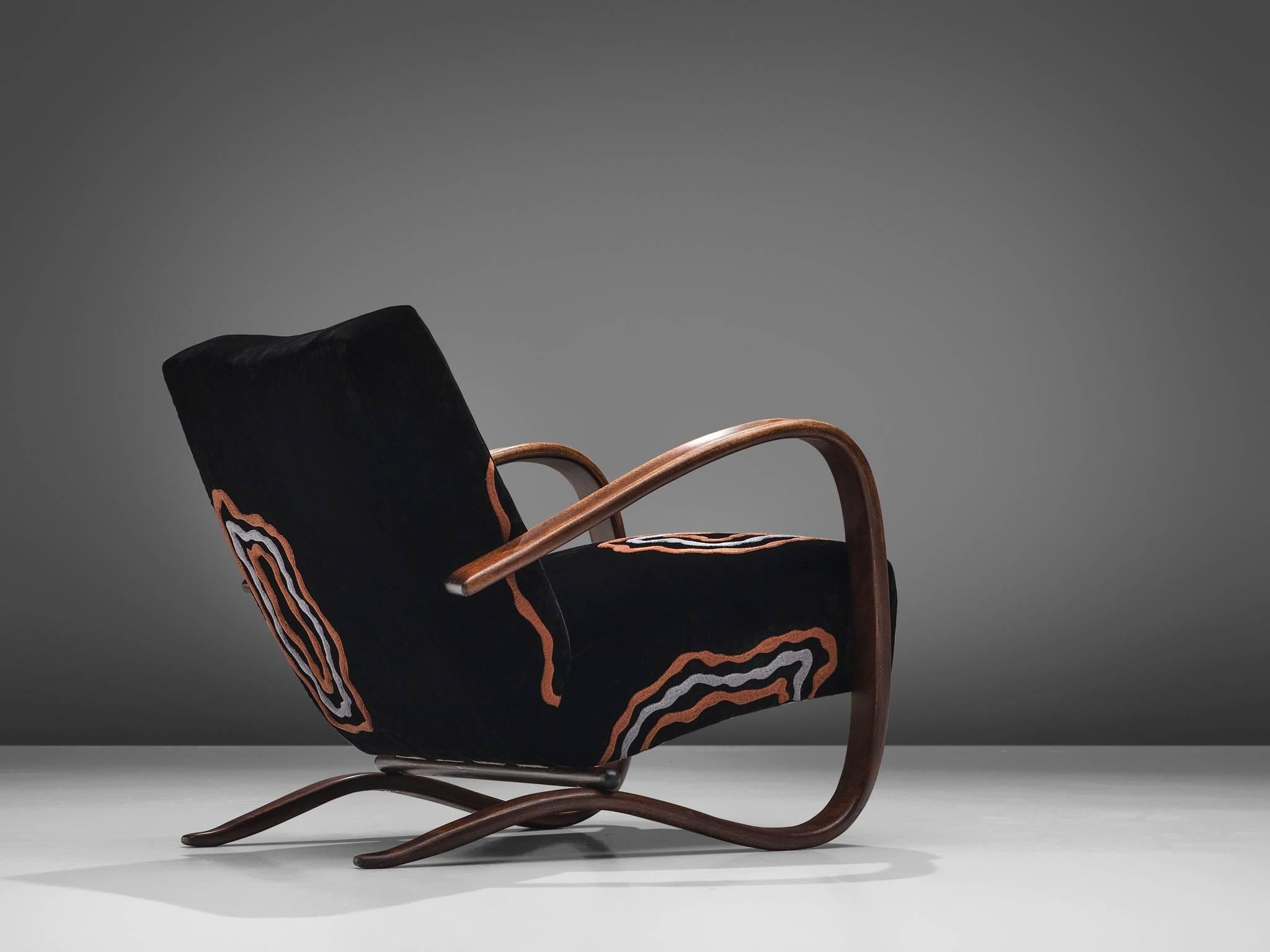 Jindrich Halabala, lounge chairs, graphical black embroidered fabric by jupe by Jackie Home, stained beech, Czech Republic, 1930s. 

This Halabala chair has been upholstered in collaboration with the Jupe by Jackie Home collection. The set is part