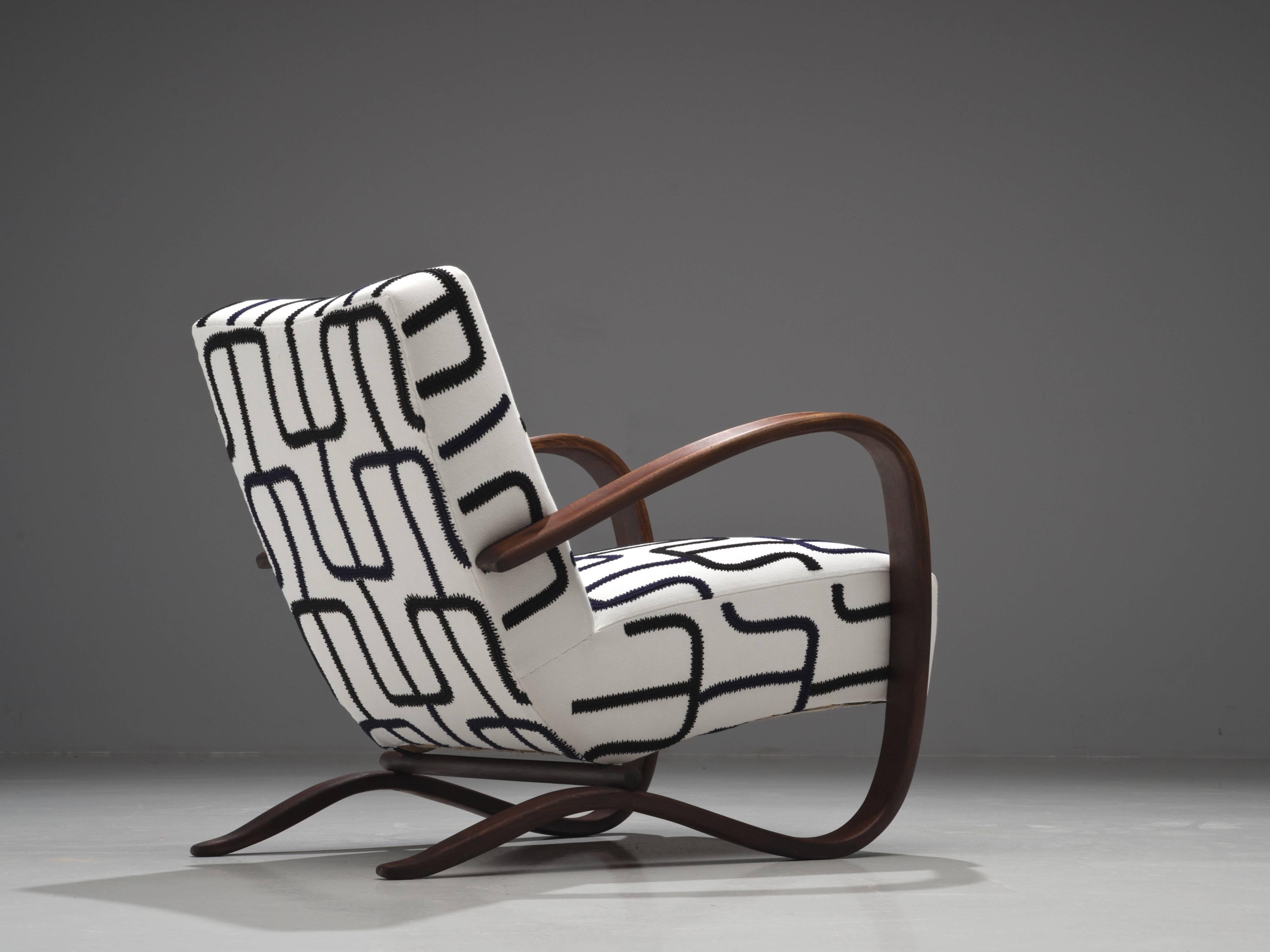 Jindrich Halabala, lounge chair, black and white fabric Jupe by Jackie Home and stained beech, Czech Republic, 1930s. 

This Halabala chair has been upholstered in collaboration with Jupe by Jackie Home collection. The chair is part of the first