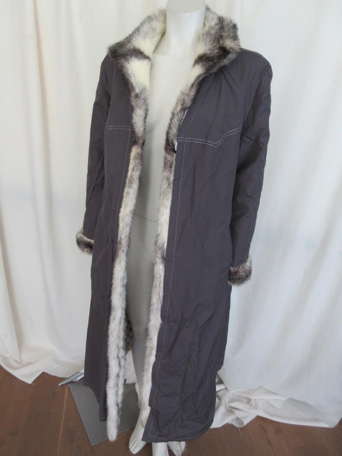 This vintage coat is made of rare kohinoor/cross mink fur, reversible

View our storefront for more mink, sable fur coats and other vintage items.

Details:
With 2 pockets each side, 3 closing hooks 
Reversible grey fabric lining embroidered with