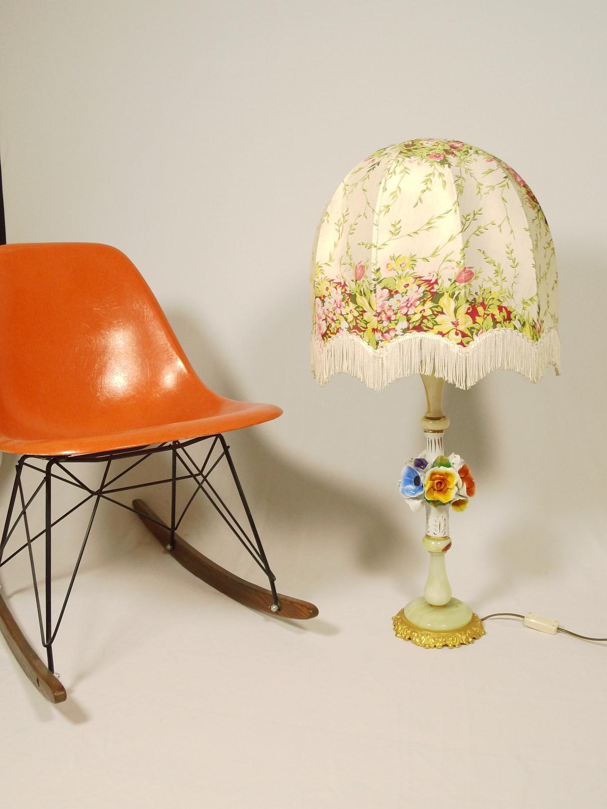 Exclusive large table lamp or floor lamp.
An original from the 1950s.

Handmade porcelain flowers on onyx base and brass. Great shade with fringes.
Very well preserved.

Makes very pleasant light.
For a person with a special style of