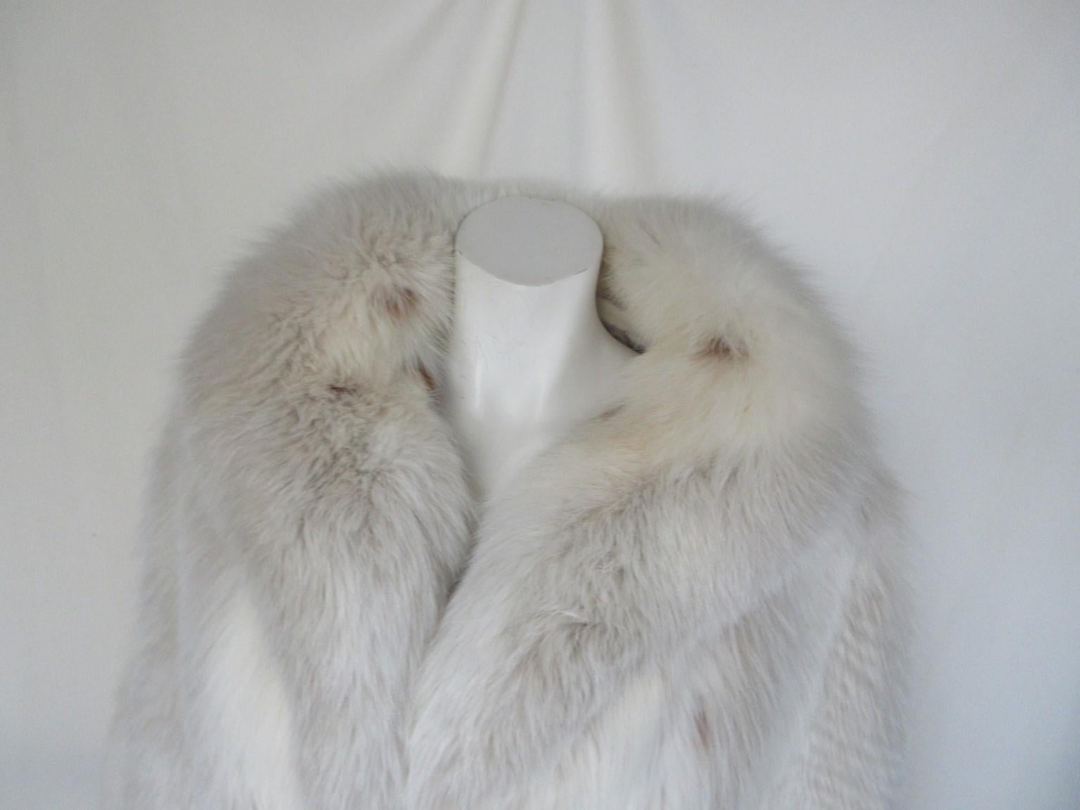 Exclusive Fox fur long coat

We offer more exclusive fur items. view our frontstore

 Details:
The coat is snow white with spots in Lynx style
With 2 pockets and 3 closing hooks 
fully lined
1 inside pocket
Fox fur feels very soft
Pristine