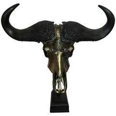 Exklusiver metallisierter Schädel eines echten Kap-Büffels