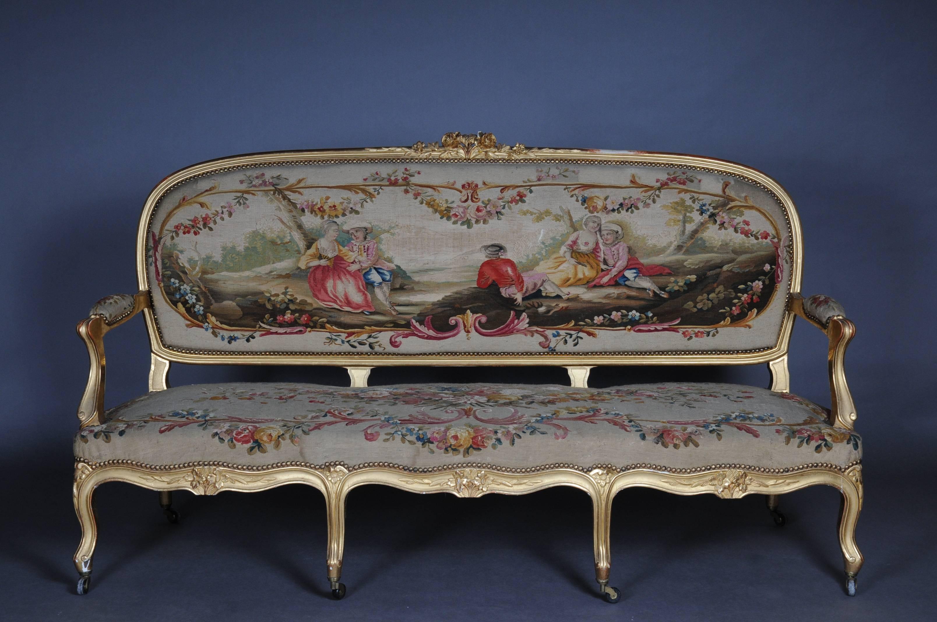 Genuine gold leaf on solid wood. Hand-carved wooden body with curved legs. Very old and decorative French sofa set

Gobelin fabric cover: Decorative floral bouquet with rococo figures. Aubusson Tapestry In the form of rococo figures and richly