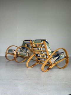 Exclusive pair of bamboo rattan lounge chairs