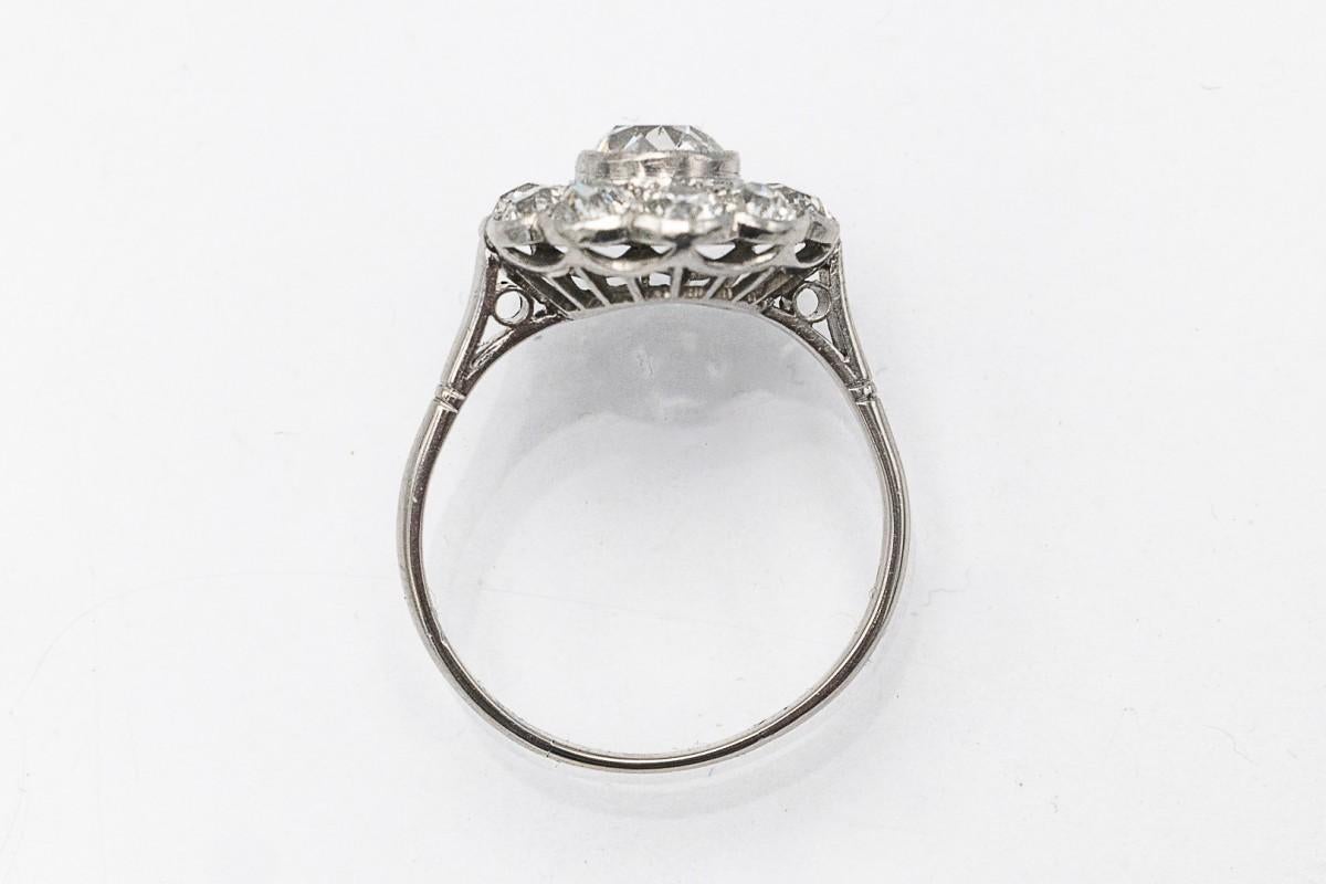 Luxurious diamond crimson ring made of 0.916 platinum.

Origin: Netherlands, first half of the 20th century

Harmonious diamond crimson creating a beautiful flower.

Central diamond weighing 0.77 ct in an old cushion cut (color H, clarity SI2)