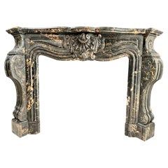 Exclusive Portoro Marble Black and Gold Antique Louis XVI Fireplace  